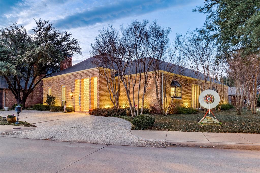 John Glasgow-designed, sophisticated two bedroom plus study in Preston Hollow near Saint Mark’s.  Elevated finishes, lighting, wallpaper and high ceilings add to the ambiance.  The wonderful entry leads to a large formal living and dining combination with fireplace, built-ins, and adjacent bar with wine chiller.  Gracious proportions accented by 10- and 12-foot ceilings, with Hollywood Regency influences throughout.  A keeping room or den is open to the gourmet kitchen featuring white quartz counters, KitchenAid 5-burner gas cooktop, double ovens, Subzero and a large island.  Brick flooring runs throughout the foyer, living areas, kitchen and bar, while hardwood floors grace the two primary suites on opposite ends of the home.  The larger bedroom includes a private office or study that can be closed off with pocket doors.  You'll love the natural light that literally pours in, as well as the gorgeous fixtures, above- and under-cabinet lighting in the kitchen, and the abundant recessed lighting throughout.  Plantation shutters, crown molding, and upgraded hardware.  An extra-wide, oversized garage provides built-in storage and a 50-amp, Level 2 EV charger. The showstopper is the central courtyard viewed by most rooms through walls of windows, accessed by either end of the home through sliding glass doors.  The perfect lock-and-leave home, presenting a remarkable, move-in ready opportunity.
