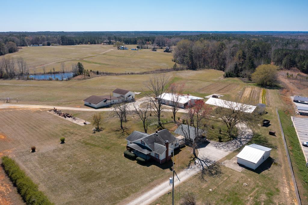 Location, location, location! It doesn't get any better than this 58 acre farm that is less than 1 mile from Interstate 85 and steps to Highway 58. Commercial development here would be ideal. There are two hotels within walking distance already, a newly built Starbucks across the street, Walmart, gas stations, Arby's, Bojangles, and the list goes on and on. This property has access to 3 roads- Cycle Lane, Old Hwy 58, and Rocky Branch Road on the backside. Relatively flat terrain and visibility from Highway 58 make this an extremely attractive property. Water and sewer are available on Cycle Lane. Most of the farm is zoned B1 while there is a home on 2 acres and (2) 1 acre sites fronting Rocky Branch zoned AG. Homes and buildings are being sold As-Is and farm equipment does not convey. VDOT report showing future road design for Cycle & Hwy 58 included in docs. Shown by appointment only!