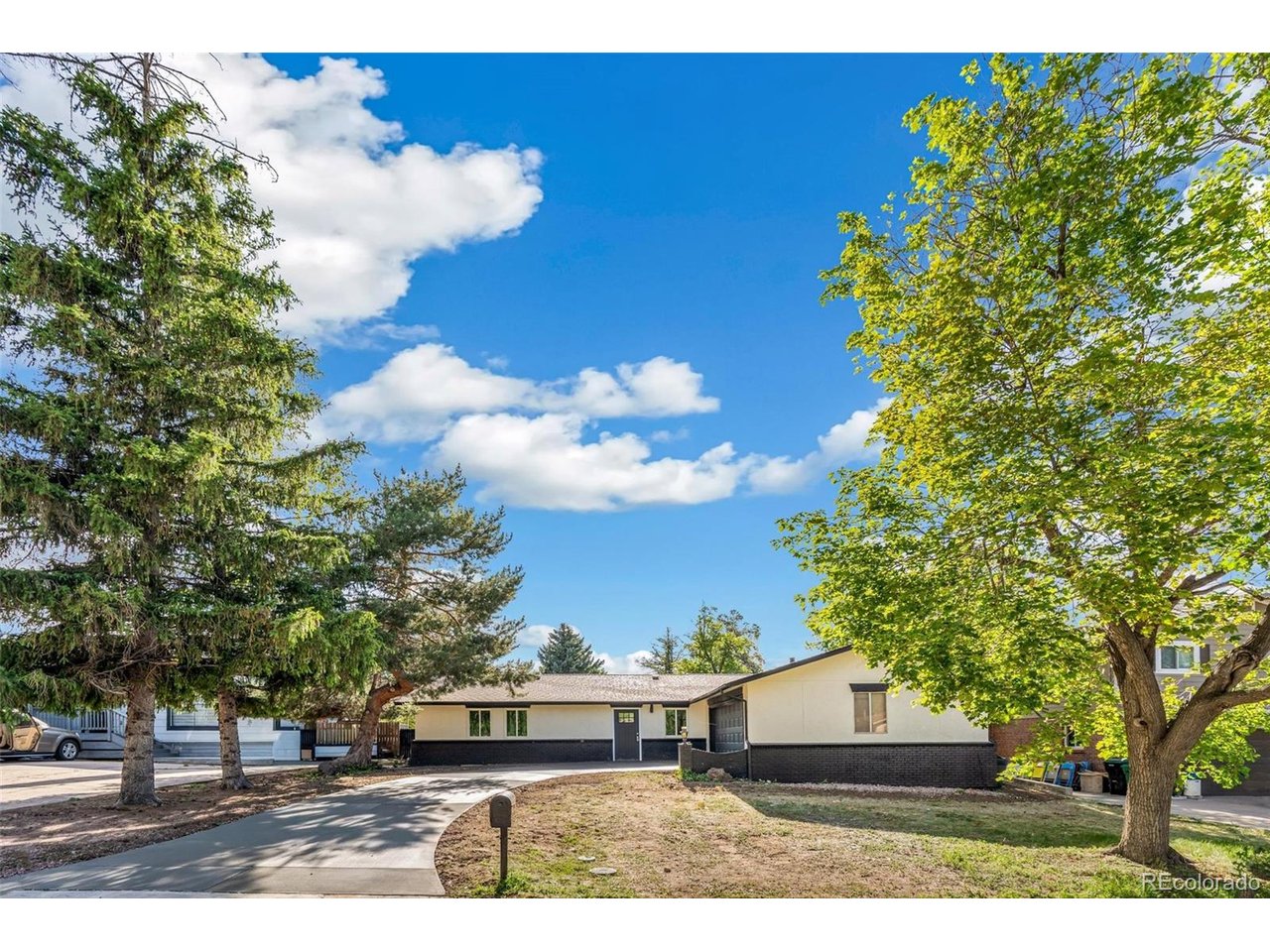 Welcome to this beautifully updated half-brick ranch-style home offering over 2,800 square feet of finished living space, situated on a fully fenced lot of over 10,000 square feet, with an attached 2-car garage and NO HOA! This move-in-ready property features 6 bedrooms, 3 bathrooms, and a spacious layout designed for comfort, flexibility, and value.The charming half-brick exterior provides timeless curb appeal, while the interior showcases modern updates throughout. The main level features luxury vinyl plank flooring, new carpet, fresh interior paint, and a stunning remodeled kitchen complete with new cabinetry, quartz countertops, stylish finishes, and stainless-steel appliances. The spacious primary suite includes a private bathroom, while two additional bedrooms and another full bath complete the main floor.The fully finished basement significantly expands the living space and includes three non-conforming bedrooms, a full bathroom, a large family/recreation room, laundry area, and a wet bar-offering excellent potential for multi-generational living, guests, home offices, or house-hacking opportunities.Enjoy the fully fenced backyard with a covered patio, perfect for entertaining, gardening, pets, or relaxing outdoors. An attached 2-car garage provides ample parking and storage.Conveniently located near Anschutz Medical Campus, UCHealth, Children's Hospital Colorado, the VA Medical Center, major highways, shopping, dining, and entertainment, this home combines space, versatility, and an unbeatable location.Don't miss this rare opportunity to own a beautifully updated home with room for everyone. Schedule your private showing today!