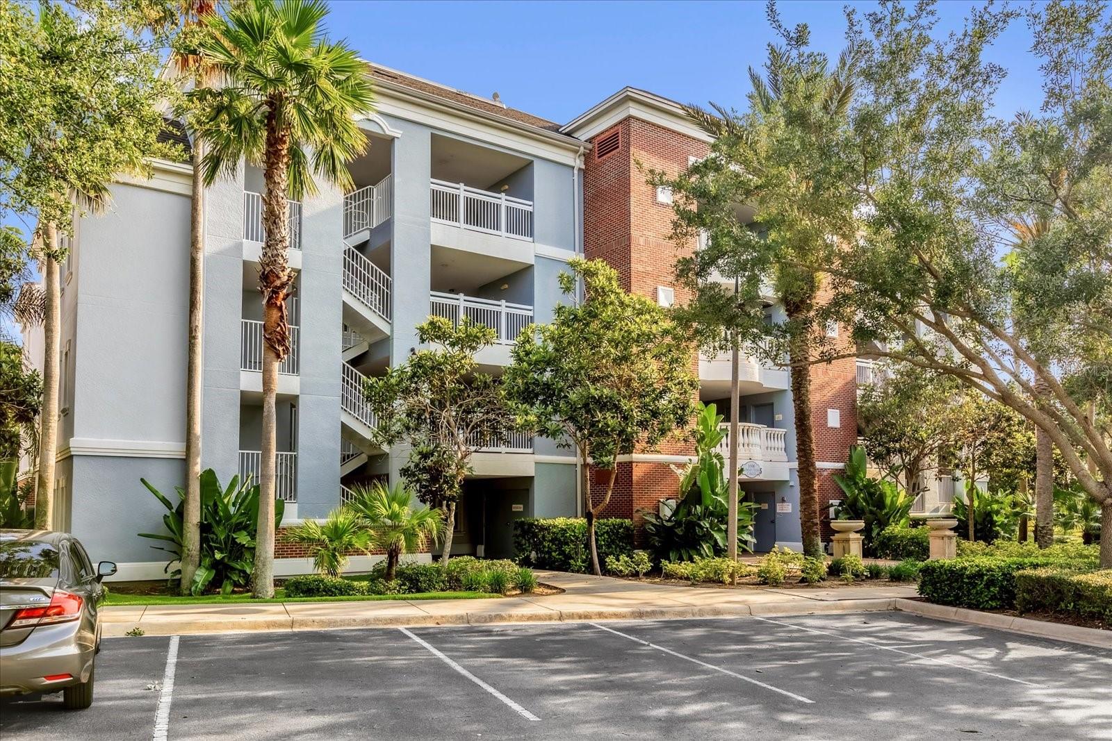 Luxury, Legacy and Lifestyle continue at this immaculate villa in the Sunset View Community of Reunion Resort.  This property will also include a FREE Reunion Resort Membership with the seller not having to pay the membership initiation fee.   This property is a highly desirable END UNIT that is filled with natural light.  A new floor has been installed and changes the entire dynamic of the property.  The property is super clean and tidy.  This open floor plan includes dining and entertainment space and is what makes these units desirable.  From the super private balcony you will catch some great golf and community views!  This is a 3 bedroom and 3 bath Villa with the master including 2 separate closets and a double vanity. You are also moments away from the pool and waterslide.  The SUNSET VIEW COMMUNITY is known for it’s stunning evening views of the Florida sky!   Reunion Resort has everything you want in a community including 3 signature golf courses, world class dining, waterparks, lazy river, water slides, firework viewing areas, tree lined streets, dog park, playground, driving range, golf simulator, member events, in-resort shuttle service, and event space. Live the resort lifestyle like a VIP. NO OTHER RESORT IN THE AREA HAS THIS!!! Easy to show and even easier to Enjoy! Minutes to Disney and close to Beaches, Universal, Lego land and Sea World.