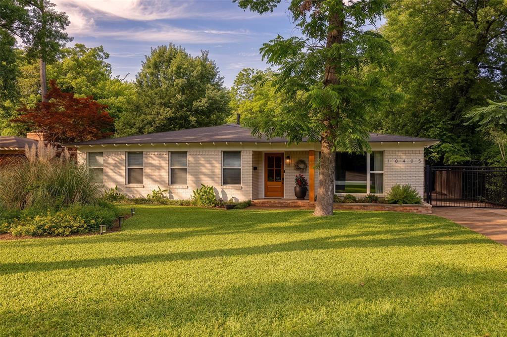 Mid-century cool meets everyday livability in this East Dallas gem, perfectly situated on a picturesque, tree-lined street just minutes from White Rock Lake. Set on a rare 70x150 lot and zoned to exemplary Hexter Elementary School, this home was designed for both effortless entertaining and comfortable daily living. Inside, the open-concept kitchen and dining spaces flow seamlessly into an oversized living room featuring beautiful built-ins and original hardwood floors that bring warmth and character throughout. Offering 3 bedrooms, 3 baths, plus a flexible office or 4th bedroom, the layout adapts beautifully to your lifestyle. Step outside to a backyard oasis made for making memories. The sparkling pool is just the beginning—there’s also an expansive grassy play yard and covered patio space, and endless space to relax, host, and unwind. A newer detached 2-car garage adds even more functionality to this exceptional property. This is East Dallas living at its best—stylish, welcoming, and ready for its next chapter.