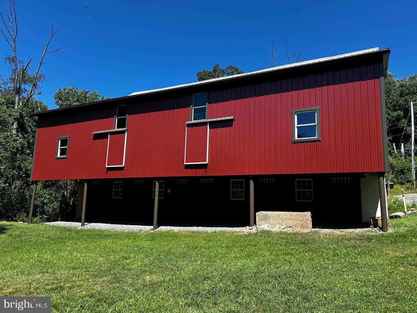 Discover a rare opportunity to own approximately 70 acres of beautiful Berks County farmland in District Township. Featuring open hay fields, a classic bank barn with animal stalls and storage areas, a pond, wooded acreage, and excellent hunting opportunities, this property offers endless possibilities for farming, recreation, and enjoying the outdoors. With approximately 17 tillable acres, two creeks, a pond, and scenic rural surroundings, this preserved agricultural property is full of character and potential. The existing farmhouse offers an opportunity for renovation or a potential rebuild to make your own farmhouse dreams come true. A truly unique opportunity to own a piece of the countryside and create your vision for generations to come. Property is in the Conservation Easement and Clean & Green so the stunning setting will be protected forever but allow you to build your farm setting. DO NOT WALK THE PROPERTY OR PARK AT THE BARN WITHOUT AN APPOINTMENT! NO TRESPASSING!