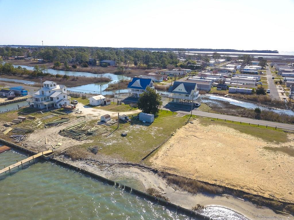 PRIME WATERFRONT On the Chincoteague Channel. Southern End of the Island on MAIN STREET. Zoned C4. BUILD RESIDENTIAL OR COMMERCIAL. Many uses with C4. SO MUCH POTENTIAL on this Deep Water Channel. SUNSETS are Amazing! Build your Dream Home or Business Here!