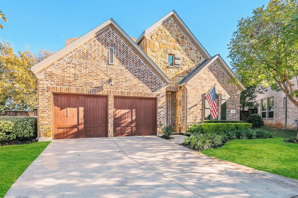 This stunning two-story home with 5 bedrooms and 4 bathrooms is located in Grapevine, within the Grapevine-Colleyville Independent School District. 

Situated on a premium oversized lot of 0.41 acres, it features a fantastic transitional space and an additional 295-square-foot heated and cooled sunroom complete with articulating glass doors, slate tile, a gas-powered wood-burning fireplace, and a TV. 

The expansive backyard is ideal for outdoor activities and relaxation. A whole-home generator, powered by natural gas with an automatic transfer switch, ensures convenience during power outages. 

The exterior showcases a beautiful brick and stone facade, along with freshly painted garage doors, siding, and trim. Inside, the space has also been freshly painted and designed with an open floor plan to meet all your needs.

The chef's kitchen boasts generous counter space, a large island with a farmhouse sink, a touch-activated faucet, a new gas range, double ovens, a designer hood, and high-end appliances. The laundry room includes built-ins for additional storage. The spacious study features glass French doors and new tile flooring.

Upstairs, you will find three bedrooms, two full bathrooms, an upstairs loft, and a large media room with wall lighting, perfect for movie nights. The primary bedroom, along with an additional bedroom with new tile flooring and a full bathroom, is located on the main floor, providing ample space. The primary suite includes a spacious bathroom with dual vanities, a walk-in shower, a garden tub, and an oversized walk-in closet with new tile. 

This home is conveniently located with easy access to DFW Airport, shopping, and dining options. For more pictures and video, please visit listing agent's website.