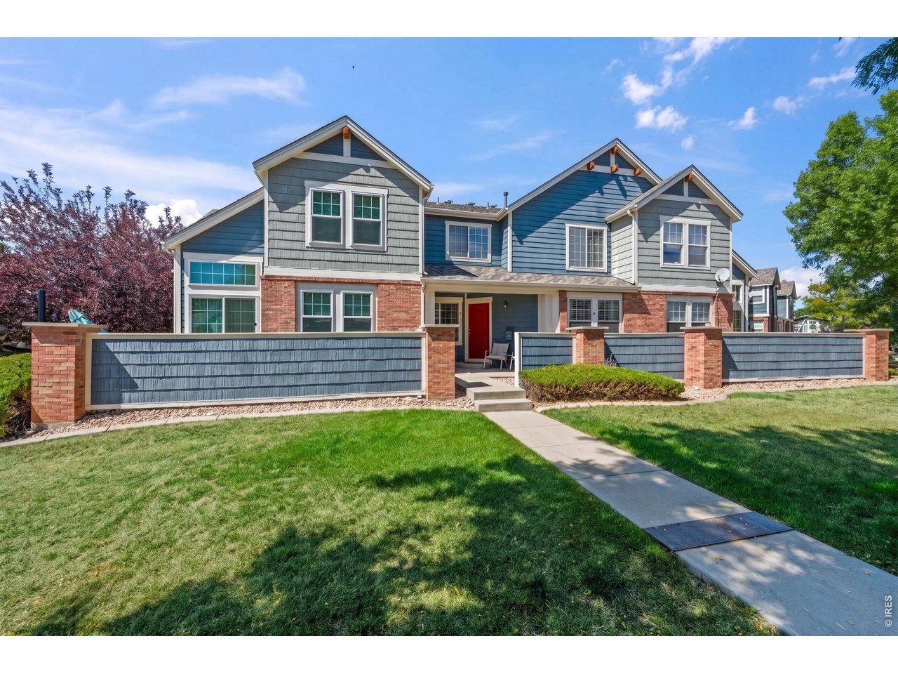Welcome home to low-maintenance living in the highly desirable McKay Landing community! This beautifully refreshed townhome offers comfortable living space with plenty of room to live, work, and entertain. Freshly painted with brand-new carpet thru-out, this move-in-ready home features an inviting main level with extensive hardwood flooring, updated lighting, and a spacious living room centered around a cozy gas fireplace. The open-concept kitchen flows seamlessly into the dining area and is equipped with updated stainless steel appliances, including a gas range, newer dishwasher & microwave-perfect for everyday living & entertaining. Upstairs, you'll find two primary suites, each with its own private full bath, providing comfort & privacy. The finished basement offers exceptional versatility with a spacious family/bonus room featuring included surround sound speakers, 3rd bedroom, updated 3/4 bath, and a convenient laundry area with included washer/dryer. Whether you need a home office, fitness room, media room, or guest space, this flexible lower level adapts to your lifestyle. Enjoy added peace of mind with major mechanical updates, including a new furnace and AC (2025). A detached one-car garage (Space #41) provides additional storage and convenience. Ideally located near top-rated schools, shopping, dining, and major commuter routes, this home also offers access to McKay Landing's outstanding community amenities, including a pool, clubhouse, parks, open space, and scenic walking trails. Plus, you're just minutes from The Orchard Town Center, making this an exceptional place to call home.