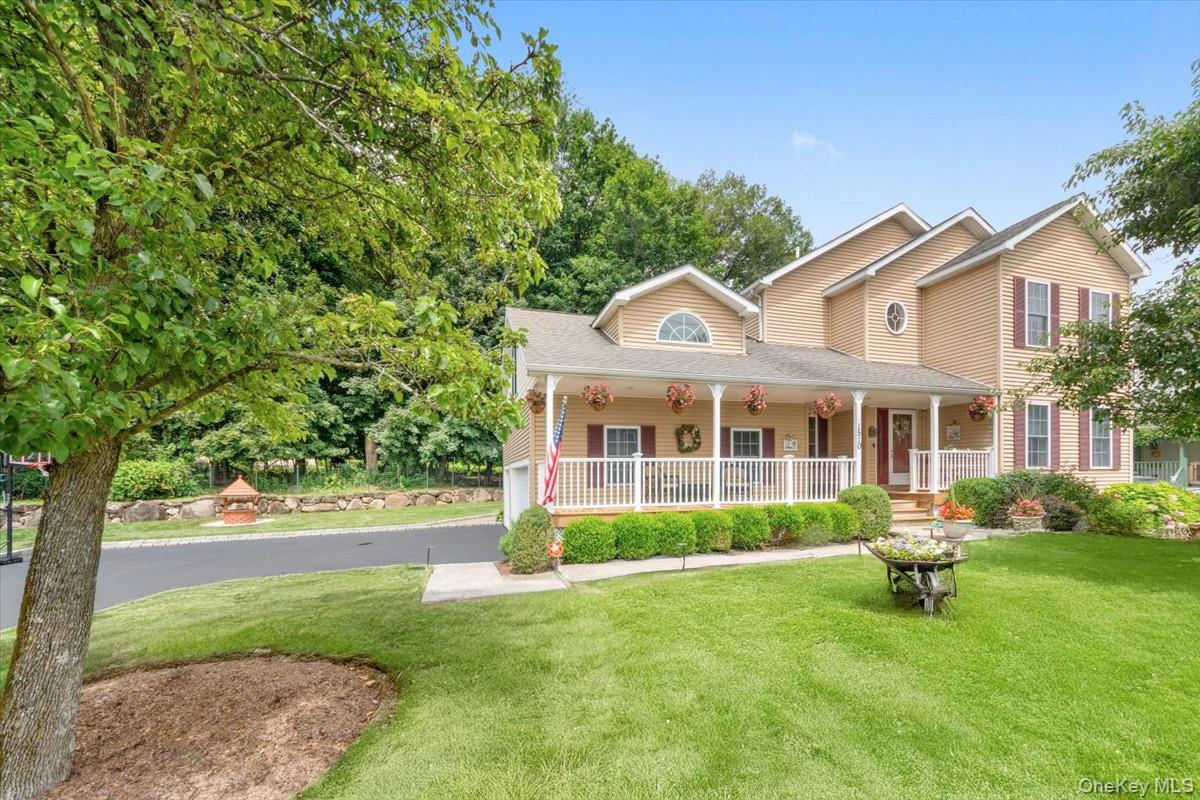 Welcome to this stunning, one-of-a-kind 3-bedroom, 4-bath Colonial offering immaculate living across four thoughtfully designed levels. From the moment you arrive, you’ll be captivated by the pristine condition and expansive layout, ideal for both everyday comfort and stylish entertaining. The entry level welcomes you with warm and inviting living room and separate den, perfect for relaxing or hosting guests. The sleek, modern kitchen features stainless steel appliances, contemporary quartz countertops, and a cozy breakfast nook with outside access to a beautiful patio and gardens. The upstairs level offers three spacious bedrooms, including a generously sized primary suite, and a beautifully updated full bathroom. The lower level provides a large recreation room, another full bath, and finished flex space perfect for a home office, gym, or extended guest stays. Step outside to enjoy the private yard and a spacious second floor deck offering breathtaking scenic views of the Hudson River and surrounding mountains. A rare 3-car garage and additional driveway parking round out the exceptional exterior features. Perfectly located just a half mile from the Peekskill Metro-North station with direct express service to NYC, this home offers the ideal blend of suburban tranquility and commuter convenience. You’ll be minutes from the scenic Peekskill waterfront, Bear Mountain hiking trails and Peekskill’s unique historic downtown, filled with charming restaurants, cafes, and vibrant local culture. Quick access to the  Taconic State Parkway completes the unbeatable location. This is truly a move-in ready gem—stunning, spotless, and one-of-a-kind.