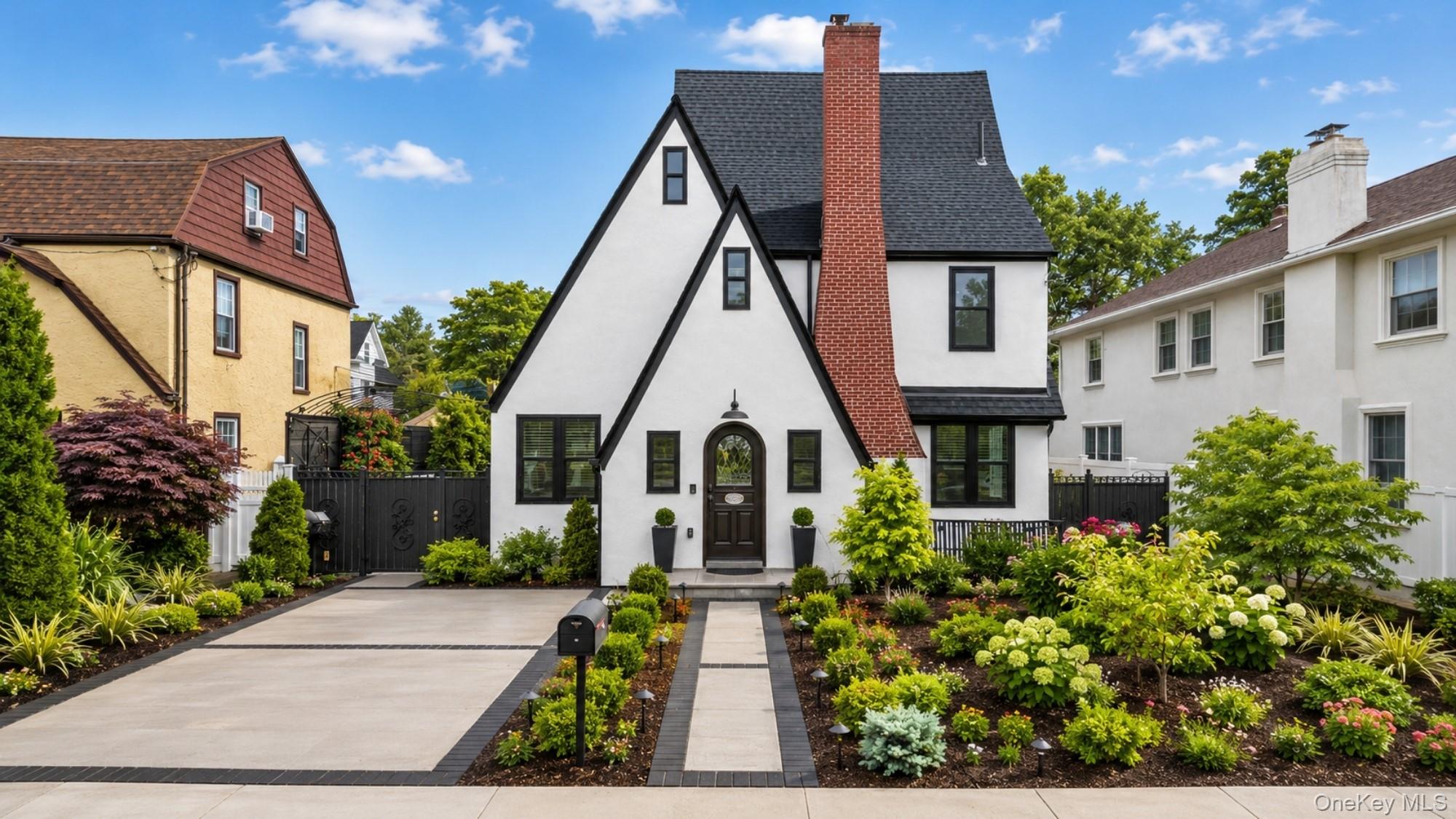 *Please see attachments for property improvements details.Welcome to this spectacular Tudor-inspired Colonial, set on an expansive 5,767-sq-ft deep lot in the highly sought-after Weeks Woodlands section of Bayside—a historic and tranquil enclave known for its tree-lined streets, distinguished period homes, excellent School District 26, and convenient access to Crocheron Park, Bay Terraceshopping and dining, marinas, and express transportation to Manhattan. Just moments from the park, the residence offers a rare combination of architectural character, modernized infrastructure, and resort-style outdoor living.The home offers 4 bedrooms and 4 full bathrooms, including (3) en-suite bedrooms, 2,360-sq-ft of sun-filled living space. A gracious arched doorway and herringbone foyer open to an elegant living room centered around a wood-burningfireplace. The main level also features a formal dining room, a light-filled sunroom with windows on three sides and a flexible first-floor bedroom with a full bathroom ideal for guests.Designed for both everyday living and entertaining, the rear of the home opens to a professionally designed outdoor retreat, highlighted by a 14' × 28' saltwater swimming pool with automatic safety cover and natural gas heating for extended seasonal enjoyment. The outdoor setting is further enhanced by a finished, air conditioned recreational /lounge space, ideal for year-round entertaining, along with thoughtfully designed areas for alfresco dining and relaxation.Beyond its aesthetic appeal, the home has undergone substantial capital improvements with comprehensive infrastructure and system upgrades rarely found in homes of this era. Major improvements include full replacement of sewer and water service lines (street through home), upgraded gas and electrical service, new roof and drainage system, high-efficiency boiler and water heater, new construction windows, and multiple interior and exterior modernization projects—offering buyers confidence, comfort, and long-term peace of mind.This is a rare opportunity to own a truly turn-key, infrastructure-modernized residence in one of Bayside’s most desirable neighborhoods, within top Queens school zones, and just a short distance to the LIRR with an approximately 25-minute ride to Manhattan for a seamless commute.Designed for both everyday living and entertaining, the property offers a professionally designed outdoor retreat with a 14’ x 28’ saltwater in-ground pool, automatic safety cover, gas heater, and engineered drainage system. A finished pool house lounge / flex space provides additional recreational and entertaining use, enhancing the outdoor living experience.Major improvements include full sewer and water service line replacement, upgraded gas and electrical service, new boiler and water heater, new roof and gutter system, full window replacement, insulation upgrades, exterior stucco, concrete hardscaping, crawl space vapor barrier, chimney upgrades, landscaping, irrigation, and more. Located near Crocheron Park, Bay Terrace shopping and dining, transportation, and School District 26.