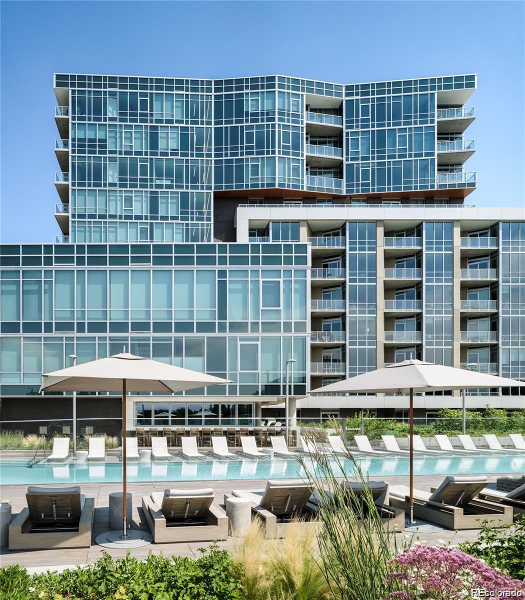 One of the best residences at Denver’s premier high-rise building the Lakehouse on 17th. This condominium was completely upgraded and customized. The views from the floor to ceiling windows of Sloan's Lake and the majestic Rocky Mountains out every window are captivating with the alpine morning glow and sunsets everyday. An open floorplan designed for your own living and dining lifestyle. Great features start with custom millwork door entry, designer lighting fixtures, 10' ceilings, modern 2' x 2' floor Miele, automated windows shades, including darkening shades in the bedrooms for optimal sleep. The chef's kitchen offers white high gloss ItalKraft designer cabinetry from Italy, modern Euro 2mm Quartz countertops and large island for seating. Top of the line Jenn-Air Induction Cooktop, integrated exhaust hood, Miele wall combo convection oven /microwave and built-in 48"Sub-Zero refrigerator. Lakehouse amenities reflect the Gold standard of Well Certification including an urban garden, year round hot tub and 70’ lake front swimming pool, fully equipped 2300 sqft fitness lab, yoga room, dry sauna, guest suite, 24/7 front desk attendant/security, craft room, extensive community gathering area with kitchen great for additional entertaining, dog spa, indoor/outdoor kitchens with gas grills & pizza oven overlooking a serene amenity plaza. Across the street to is Sloan’s Lake your close by park with paths, tennis courts, paddle boarding/kayak or canoes are allowed.  Our the front door are close by restaurants including two in the building- Gusto! Italia & ChoLon Asian cuisine.