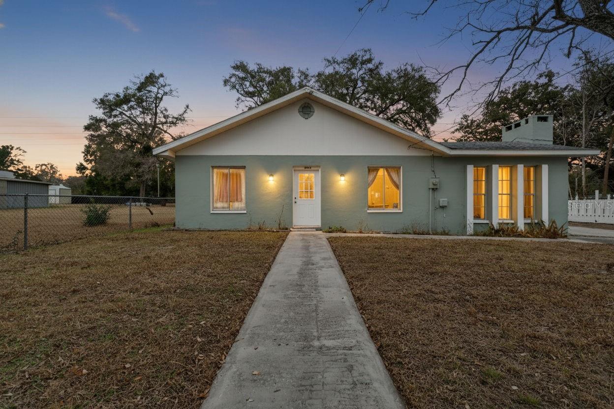 Investor opportunity with tenant in place. This spacious concrete block home offers 5 bedrooms, 3 full bathrooms, and sits on a generous 0.31-acre lot with no HOA, no CDD, and no deed restrictions. Tucked away on a quiet, private road, the setting offers a peaceful, tucked-away feel while still providing convenient access to nearby amenities. The home features durable block construction and a large in-ground pool with approximately 9-foot depth, creating long-term appeal for future occupants. The oversized lot provides room to spread out and flexibility for a variety of uses. Current tenants are in place and would prefer to remain, offering immediate rental income potential and a seamless transition for the next owner.