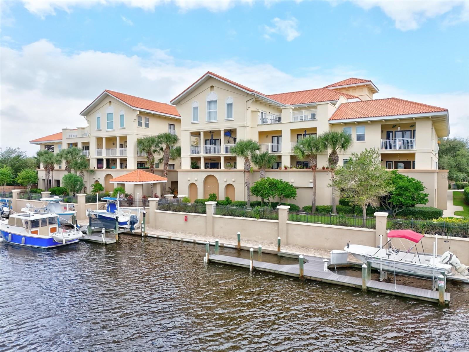 Virtually Staged. Assumable VA loan at 2.299 %! Some photos are virtually staged. 2-10 Transferable Home Warranty through July 2027. Experience elevated coastal living at Bella Harbor Condominiums. This beautifully appointed 3-bedroom, 2-bath condo offers stunning views of the saltwater canal leading to the Intracoastal Waterway, stylish upgrades, and exceptional comfort. Enjoy high ceilings, crown molding, freshly painted walls, and beautiful porcelain tile throughout the main living areas and bathrooms. The spacious primary suite features a private en-suite bath, while the second bath offers access from both the second bedroom and main living area. French doors open to a large private balcony overlooking the saltwater canal—perfect for relaxing and watching boats cruise by as they make their way to the Intracoastal. The upgraded interior features state-of-the-art appliances and a custom-built entertainment wall with TV, sound bar, and remote-controlled electric fireplace. Brand-new A/C provides added peace of mind. All TVs, surround sound, and the gas grill on the side balcony convey. Handicap accessible. Bella Harbor offers a community pool and inviting spaces for entertaining. Just minutes from the charming European Village, with shopping in the cobblestone courtyard, and the weekly Sunday farmers market/craft fair.  Of course, pristine beaches are nearby. Historic St. Augustine is approximately 30 minutes away, Orlando attractions 1½ hours, Daytona Beach International Airport 30 minutes, and Jacksonville International Airport 50 minutes. Whether a full-time residence, vacation getaway, investment, or seasonal retreat, this condo offers an exceptional combination of luxury, location, and lifestyle. Come experience it for yourself!