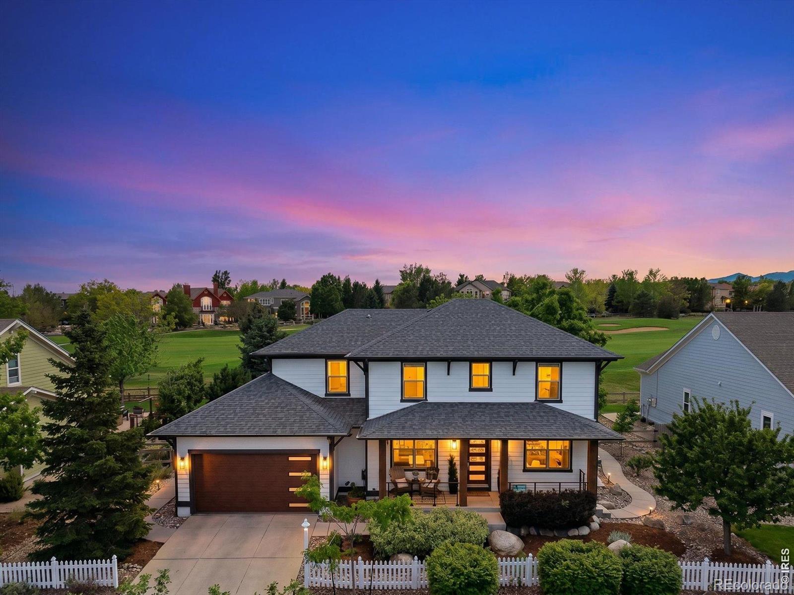Experience one of the most extraordinary golf course homes in Boulder County. This completely reimagined luxury residence backs directly to the 4th fairway of Indian Peaks with sweeping views toward the Boulder Flatirons. This stunning Craftsman-style home offers four bedrooms, five baths and has been impeccably renovated for elevated Colorado living. Every detail has been curated for luxury, comfort, technology and energy efficiency. Exquisite designer finishes, professional-grade chef's kitchen, extensive smart home technology and inspiring work-from-home office studios designed for today's luxury lifestyle. Entertain effortlessly with a custom wet bar and an incredible temperature-controlled 700+ bottle wine cellar. Spectacular main level primary suite delivers a true spa experience featuring a steam shower, oversized bubbler soaking tub and radiant heated floors. The outdoor living experience is equally breathtaking with a custom architectural pergola, gas firepit, tranquil water feature with incredible golf course + mountain views - creating a true private resort atmosphere. This home also represents the future of luxury living with a Tesla energy ecosystem including a 14.45 kW solar array, dual Powerwalls providing days of backup power and highest output EV wall charger. See features sheet!