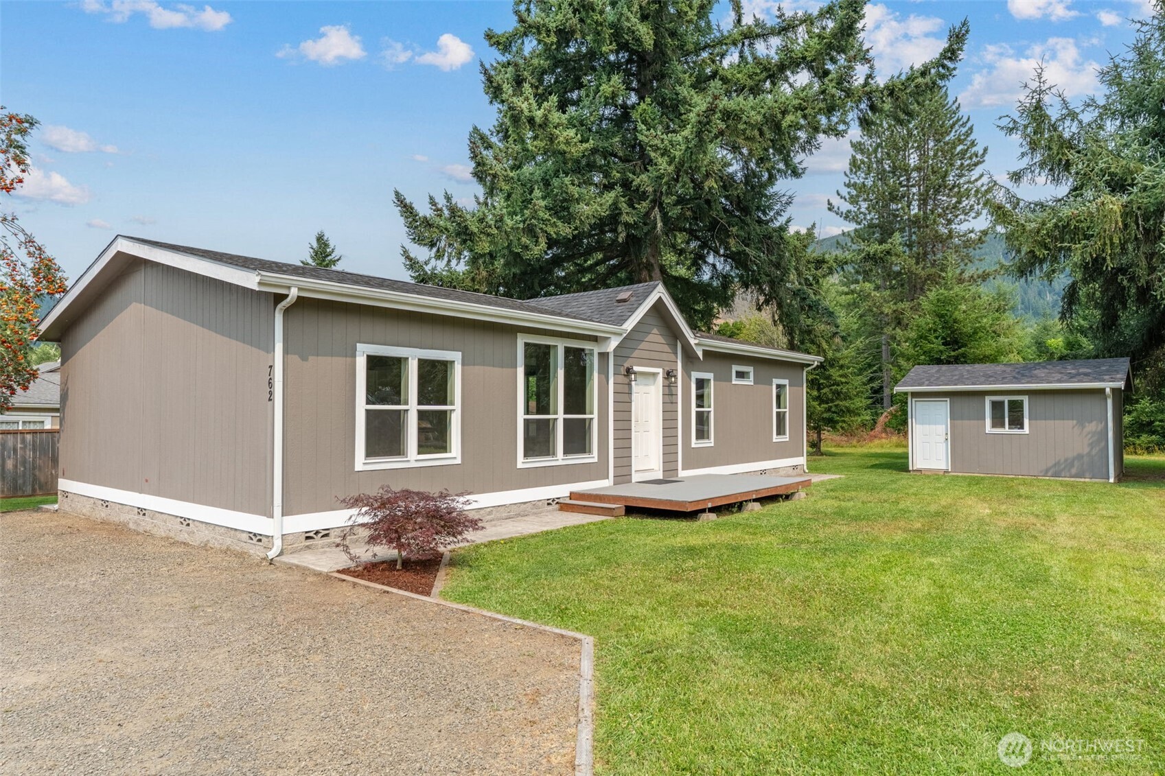 This beautiful, 3bdrm 2 bath home is like new inside and out. It features many upgrades including brand new GE stainless appliances, new carpet in bedrooms and family room, plus new LED ceiling lights throughout.  A stamped concrete sidewalk leads to a nice sized trex deck and to the front door. The spacious, open floor plan revolves around the kitchen that boasts a center island and lots of cabinet storage. The large family room has an awesome entertainment center that features floor to ceiling bookshelves and room for a large TV. Coffered ceilings add elegance as do the crown moldings and recessed lighting. Oversized windows allow in lots of light with views of distant mountain scenery. The primary suite features easy access to the bathroom where you'll find double sinks and a large walk-in closet. The utility room, off the kitchen, has washer/dryer hookups and easy access to the forced air heating system. The home is located in a quiet neighborhood and features ample off-street parking. The good sized city lot also features a 12X16 storage shed. The Tilton River, Gust Backstrom City Park and the Historic Downtown district are within easy walking distance.  The many local mountains, lakes and rivers are literally minutes away and offer a multitude of awesome outdoor recreational opportunities.