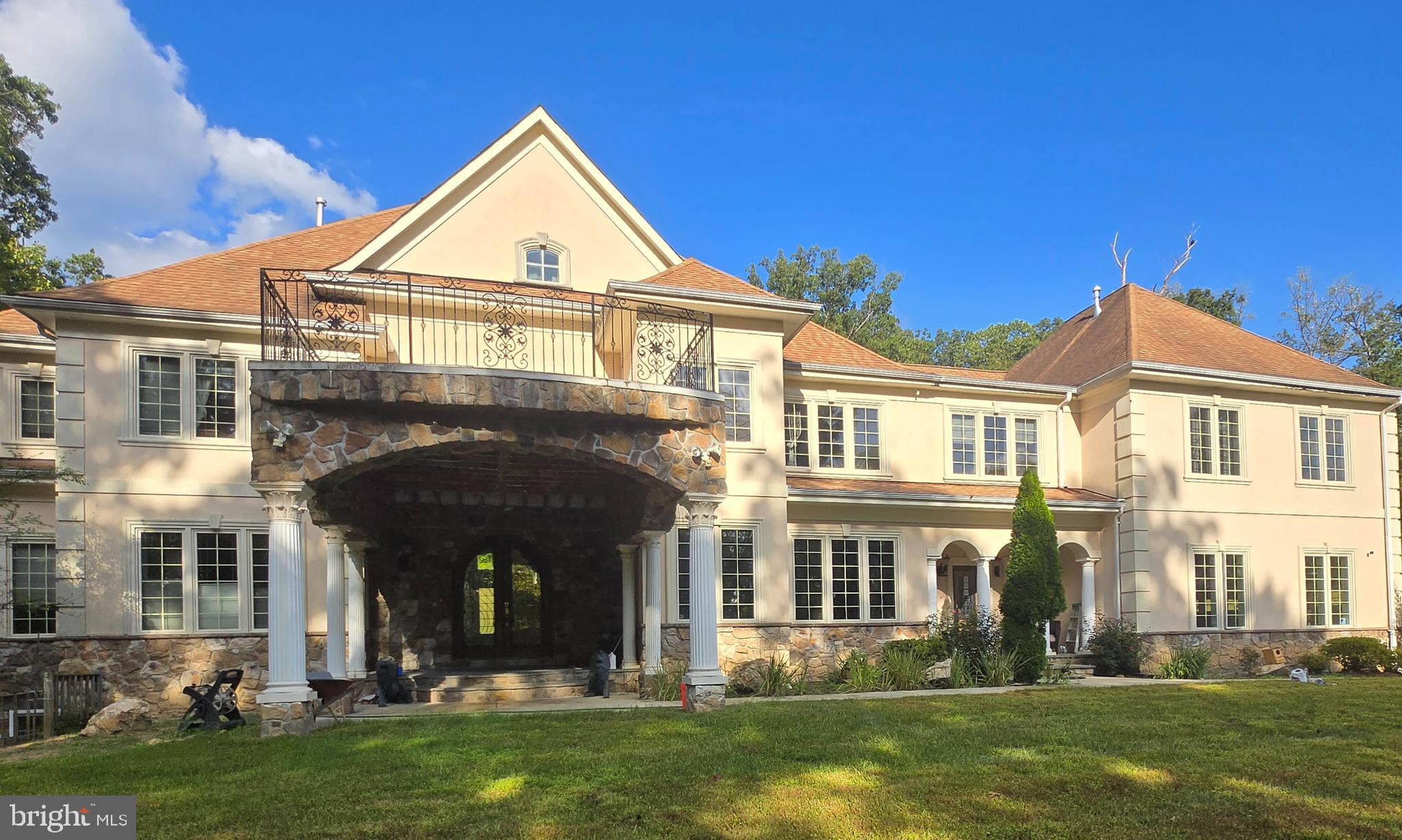 PRICE REDUCTION -Welcome to 7145 Brooks Rd — an extraordinary colonial estate nestled on 5 private acres in prestigious Highland. Boasting over 10,000 square feet of meticulously designed living space, this stunning home features 6 spacious bedrooms and 7 luxurious baths, offering unparalleled comfort and flexibility for both family living and grand entertaining.  Step inside to soaring ceilings, elegant architectural details, and sun-drenched rooms throughout. At the heart of the home is a gourmet chef’s kitchen outfitted with top-of-the-line appliances, custom cabinetry, and expansive prep space — perfect for hosting and culinary creativity. The flowing layout connects formal and informal living areas, including a stately dining room, oversized family room, and private home office, and an elevator nook. Retreat to the expansive primary suite with a spa-inspired bath and custom walk-in closets. The fully finished lower level offers additional living space, a game room, home gym, or theater potential. Outdoors, enjoy the serenity of 5 acres with endless possibilities — from quiet relaxation to hosting unforgettable gatherings.