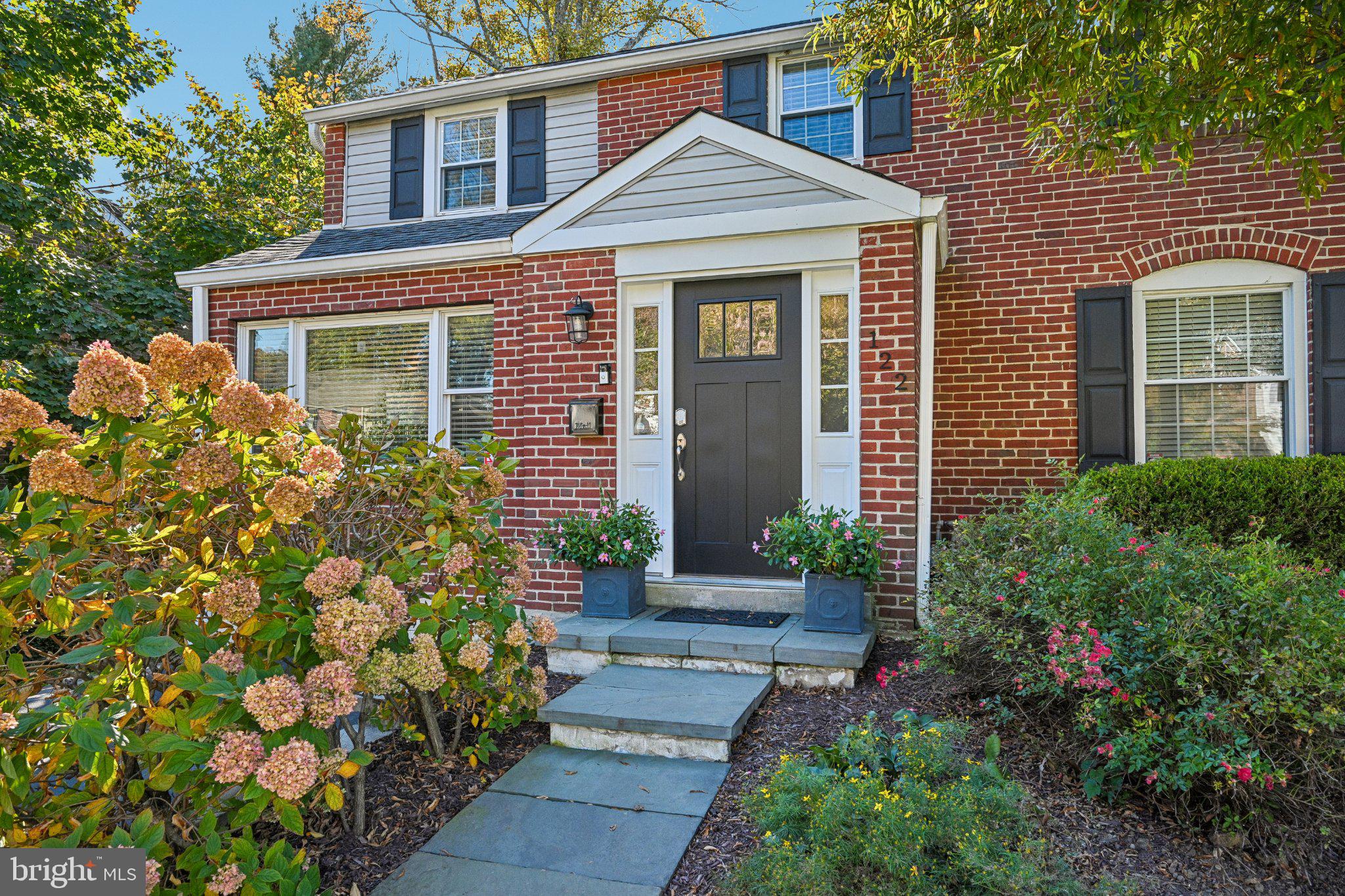 Welcome to this expanded, fully renovated Brick Colonial, perfectly situated in the highly sought-after Conestoga Village section of Radnor Township. With 2,800 square feet of meticulously designed living space, this residence is significantly larger than most homes in the area and blends classic architectural charm with the finest modern luxuries.From the moment you step into the impressive foyer—featuring extra height and an elegant decorative ceiling—the spectacular open floor plan unfolds. Gleaming hardwood floors and designer recessed lighting run throughout the main level, flowing seamlessly from the foyer into a bright, welcoming living room. The space continues into the sophisticated dining room, featuring a custom bar and built-in wine cooler—perfect for dinner parties. At the heart of the home, an ultra-finished island kitchen is a chef's dream, opening directly to a spacious family room anchored by a cozy gas fireplace. The exceptionally versatile first floor is completed by a separate playroom and a pristine full bath, offering the perfect footprint for a private home office or a convenient first-floor bedroom suite.Upstairs, the center hall with hardwood flooring leads to three nicely sized, comfortably carpeted bedrooms and a beautifully appointed hall bath boasting double sinks and a marble-topped vanity. The 4th bedroom, the primary suite is a massive, private sanctuary with a generous walk-in closet and a luxurious primary bath featuring unique, high-quality finishes. For ultimate modern convenience, a dedicated laundry center is also located on this upper level.The living space extends to the lower level, where the 227 sq ft finished portion of your basement serves as the perfect media room and television entertainment area. Outside, your private outdoor oasis awaits. A beautiful patio, accessible directly from the kitchen and family room, extends your entertaining space into a fully fenced yard with a large shed for garden storage.Beyond the front door, you'll find an unbeatable, highly walkable lifestyle. Leave the car at home and walk to Villanova University, local trains, buses, and vibrant neighborhood eateries like Exit 13, Garrett Hill House, and Flipping Bailey's.Best of all, you'll be part of a deeply connected neighborhood with year-round traditions. Nearby Clem Macrone Park is the ultimate community hub, offering hours of park fun, hosting the beloved annual children's summer concert series, and bringing neighbors together for the historic 4th of July parade and picnic. As winter approaches, the community spirit shines bright with the annual Garrett Hill Tree Lighting ceremony. Don't miss the chance to own this rare Radnor Township gem, where luxury living meets an unparalleled, lifelong community experience.