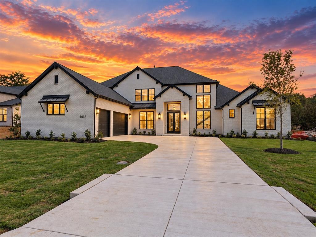 Experience a new standard of luxury living in The Miles, an exceptional residence by Olivia Clarke Homes offering 4,989 square feet on a rare half-acre homesite near Lake Lewisville. This stunning two-story home blends elegant design with everyday functionality.Upon entry, soaring ceilings and expansive living spaces create an immediate sense of sophistication. At the heart of the home, a chef-inspired kitchen features a built-in refrigerator and freezer, abundant cabinetry, generous prep space, and an oversized island overlooking the family room. A dramatic floor-to-ceiling fireplace anchors the space, creating a warm and inviting setting for gathering.Designed for flexibility, the home offers 5 spacious bedrooms, each with a private bath, including 2 bedroom suites on the main level. A dedicated media room provides the perfect setting for movie nights, while the upstairs game room offers additional space for recreation and entertaining.The expansive half-acre homesite offers a sense of openness rarely found in new construction communities. A covered 44' x 14' patio with an outdoor fireplace creates a seamless extension of the living space and overlooks a backyard with ample room for a resort-style pool, outdoor kitchen, or private retreat.Additional highlights include a 4-car garage, designer finishes, and exceptional craftsmanship throughout. Located in sought-after Lakewood Village, residents enjoy a relaxed lakeside lifestyle with convenient access to shopping, dining, and entertainment.NO HOA, NO MUD tax, and NO PID tax.Combining scale, flexibility, and outdoor potential, The Miles presents a rare opportunity to enjoy luxury living on a homesite that feels every bit as impressive as the home itself.