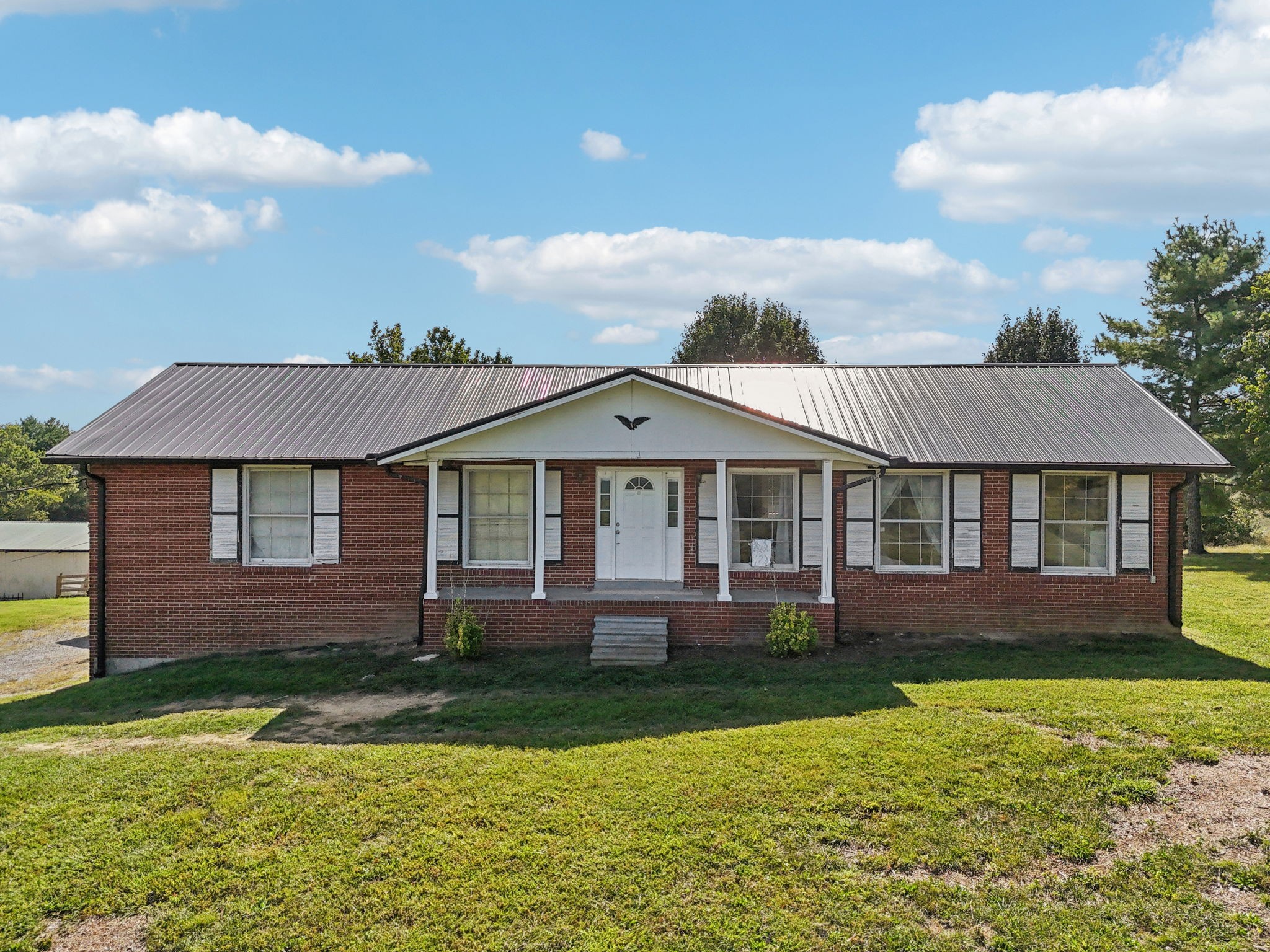 Welcome to 7661 Rocky Fork Road, a rare 15.2-acre opportunity in the heart of Smyrna. This one-of-a-kind property combines the tranquility of open land with the convenience of being close to everything.

The property features a classic 3-bedroom, 2-bath all-brick ranch home with an inviting open floor plan and a full walkout basement—perfect for adding additional living space or creating a private retreat.

Outside, the land speaks for itself: rolling pastures, fully fenced for livestock, and a barn ready for animals or equipment. Whether you’re dreaming of a hobby farm, a private homestead, or space to simply enjoy the outdoors, this acreage provides endless possibilities.

What makes this property truly special is its potential. Not only can you make the existing home your forever residence, but with its prime location and size, there may also be future opportunities for development or investment.

Properties like this rarely come to market—don’t miss the chance to make this slice of heaven your own.