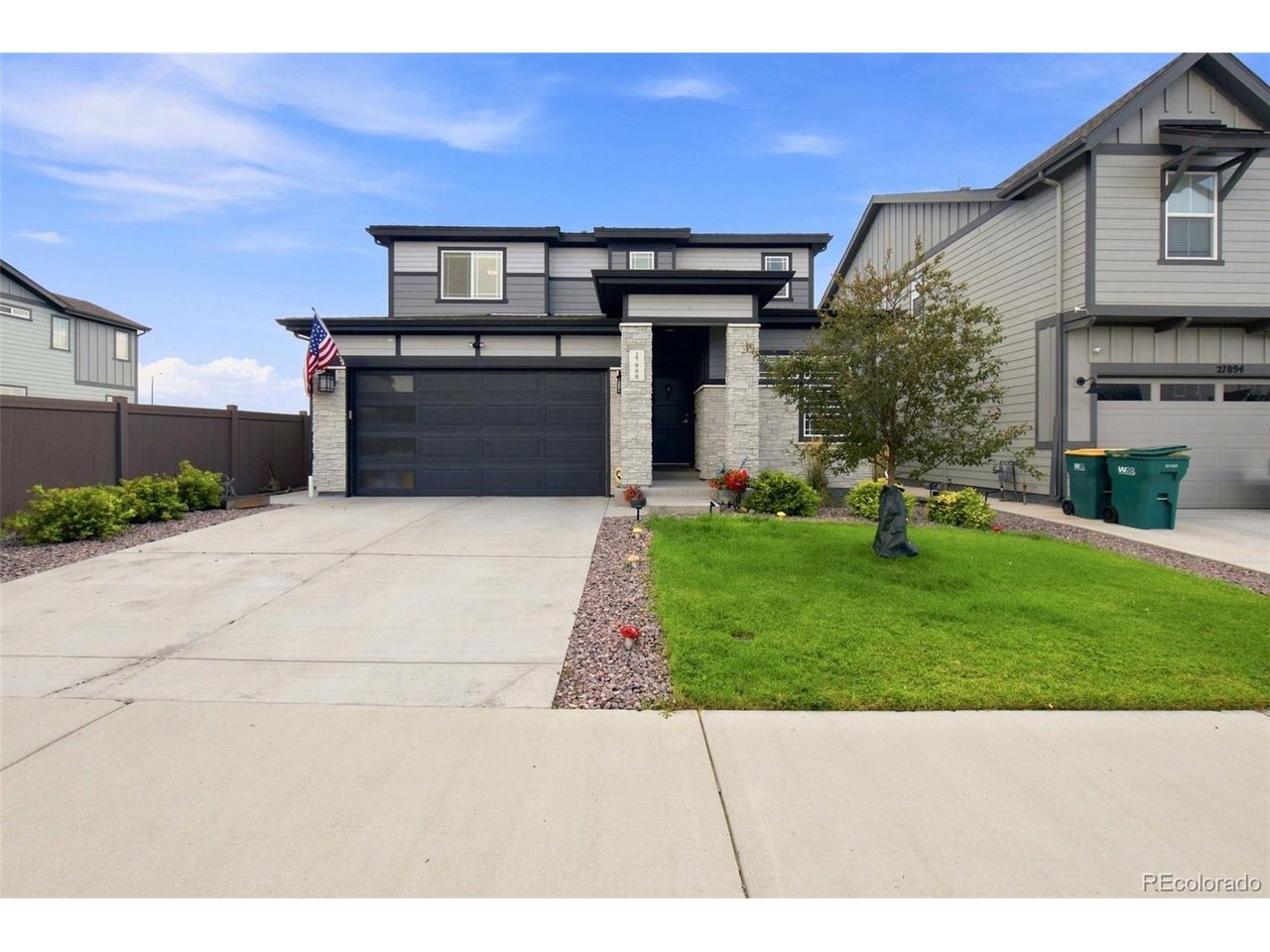 Turnkey & beautifully positioned on a premium lot, this newer 3-bed, 3-bath home offers the appeal of new construction without the wait or added expenses to finish the details. Newly built in 2022, this home includes ~ $70,000 in selected upgrades. The location offers added privacy with no homes behind & has a walking path / open space along one side. The open floor plan flows throughout the main level connecting the kitchen, living, & dining room. Inside, the chef's kitchen is a stunning oversized island, walk-in pantry, 42-inch upper cabinets, painted maple cabinetry, rollout shelving, crown molding, stainless appliances, gas stove, hood, & refrigerator w/ screen. Step through oversized sliding glass doors to the covered back patio, offering an incredible flow for indoor / outdoor entertaining. This unique space easily allows for year round outdoor-living. The backyard backs to open space and has been recently finished with artificial turf for a polished, low-maintenance experience. Other builder upgrades include: luxury vinyl plank flooring spanning throughout the main level, 8-foot main-level doors, upgraded lighting, iron stair case, laundry cabinetry, ceiling-fan prewires & now installed fans, Cat6 connections, & an upgraded primary bath with dual sinks. Main level office could easily be transformed into a 4th bedroom, or a buyer could add doors to create additional office privacy. The crawlspace has concrete floors, is clean, & allows for great storage. Window coverings, refrigerator, landscaping, paint, ceiling fans, backyard turf, and garage ceiling storage are already in place-making this home better than new. Sky Ranch is a wonderful community with 4 parks throughout, and boasts the new Sky Ranch Academy (K-12 school) within walking distance. Come see this stunning property in person!
