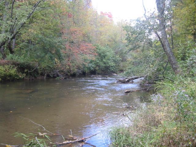 Escape to your own private paradise with this 2.44 acre creekfront property in beautiful Murphy, NC.  Nestled along a serene trout stream, this lot offers peaceful waterside living and endless outdoor opportunities.  Bordering Indian Land, the property provides a sense of seclusion while still being conveniently accessible.  Imagine morning coffee by the water, fishing right in your backyard and owning both sides of the stream.  Build your dream cabin or home in this tranquil setting.