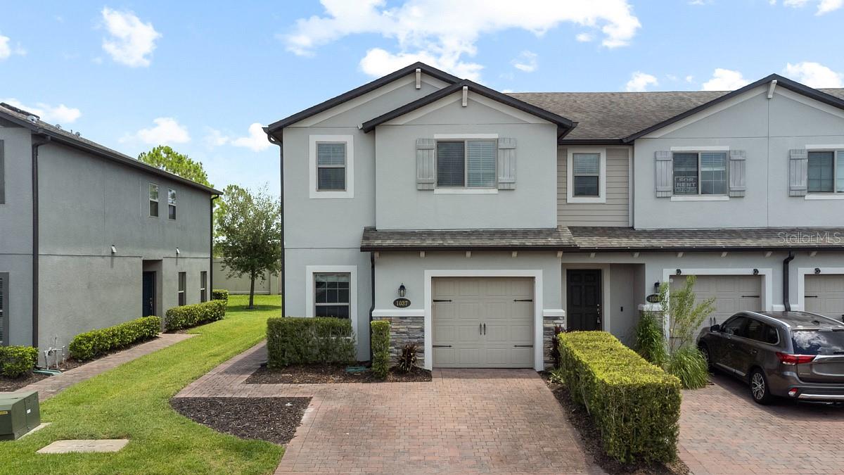 Welcome to this beautiful 2019-built Townhouse offering 4 bedrooms, 3 bathrooms, and 1-car garage in a private gated community in the heart of East orlando.This well-maintained home is in excellent condition and features a freshly painted interior, ceramic tile throughout the first floor, and an open-concept floor plan designed for comfortable everyday living.The spacious kitchen overlooks the living and dining areas and boasts a large island, granite countertops, stainless steel appliances, and ample cabinet space- perfect for entertaining family and friends. A Convenient first-floor bedroom and full bathroom provide an ideal setup for guests or a home office.Upstairs, you'll find a generous primary soute featuring a walk-in closet and a private bathroom, along with two additional bedrooms and versatile loft that's perfect for a home office, media room,or play area.Large windows throughout the home fill the space with an abundance of natural light.Ideally situated at the end of a quiet dead end street, this home offers added privacy while still being just minutes from  top-rated schools, Avalon Park, Waterford Lakes Town center, shopping, dining, and major roadways for an easy commute. The community features a swimming pool, playground, and low HOA fees, making this an exceptional opportunity to own a move-in ready home in one of Orlando's most desirable locations.