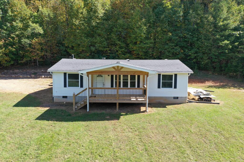 Fall Into Your Own 3-Acre Tranquil Getaway Discover the perfect blend of peaceful country living and convenient access to nearby amenities with this inviting 3-bedroom, 2-bath home nestled on 3 beautiful acres. Offering 1,120 square feet of comfortable living space, this property is a wonderful opportunity to slow down, enjoy nature, and create the lifestyle you've been dreaming of.  The home was remodeled in 2016, including a new roof, and has recently been refreshed with a fresh coat of interior paint. A new front deck provides the perfect spot to enjoy your morning coffee, unwind in the evening, or simply take in the peaceful surroundings.  Outside, you'll find gently rolling yard space ideal for gardening, outdoor activities, pets, or simply enjoying the open space. Mature standing trees add natural beauty and a sense of privacy, making this property a great fit for a small hobby farm, a country retreat, or anyone looking to enjoy a little more room to roam.  Conveniently located near Galax, you'll enjoy the feeling of being tucked away from the hustle and bustle while remaining within a short drive of Mount Airy, Winston-Salem, Roanoke, and Bristol.  Whether you're dreaming of a simpler lifestyle, a place to spread out, or your own peaceful escape, this property offers a wonderful opportunity to make it your own. Come experience the tranquility and possibilities of country living!