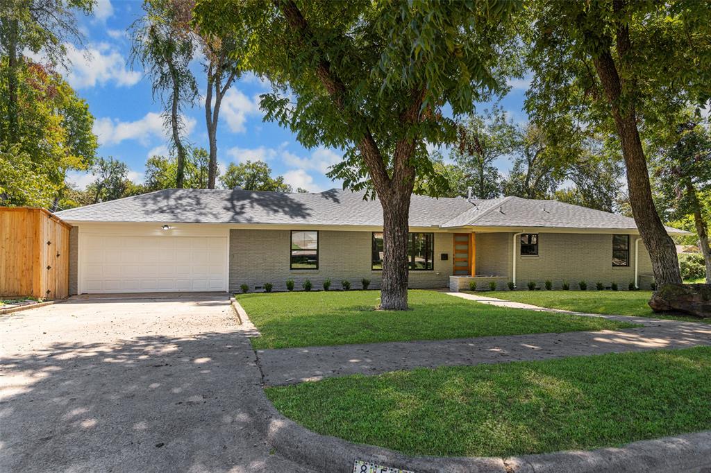 Land. Location. Lifestyle. A rare opportunity in coveted Forest Hills: own a beautifully renovated home on San Leandro Drive for under $1M. Move right in today, build equity, then expand at your leisure in a premier neighborhood moments from White Rock Lake. Nestled among majestic trees, grand homes, and custom builds, this reinvigorated ranch on a spacious .295 acre corner lot offers endless opportunities. 
Inside, an airy open-concept floor plan highlights warm wood floors, natural light, and curated finishes. Dramatic lighting and a striking floor-to-ceiling brick fireplace anchor the living and dining spaces, which flow seamlessly into the generous kitchen. The heart of the home is a showstopper—with playful backsplash, rich cabinetry, designer details, and abundant counter space. Foodies will love the 6-burner gas stove, perfect for crafting memorable meals. Just beyond, the bright laundry room—adorned with whimsical tiling and ample space—leads to the two-car garage, which in turn *provides access to the backyard.*
Three inviting bedrooms include a serene primary suite with ensuite bath and backyard deck access, while the secondary rooms share a beautifully appointed full bathroom.
The spacious backyard offers space to gather, play, or add a pool to create your dream retreat. An expansive deck and paver patio create an effortless extension of indoor living outdoors, while a powered shed, offers endless potential for storage, a workshop, or creative retreat.
Here, lifestyle is unparalleled. Stroll to White Rock Lake, the Dallas Arboretum, or the Trinity Forest Spine Trail. In minutes, enjoy shops and dining in Casa Linda and Lakewood, tee off at Tenison Park, or reach vibrant Downtown Dallas in just 10 minutes.
An investment in both lifestyle and equity, this Forest Hills gem combines immediate move-in ease with the lasting value of land and room to expand.  Land, location, and lifestyle in one compelling package - without the million dollar price tag.