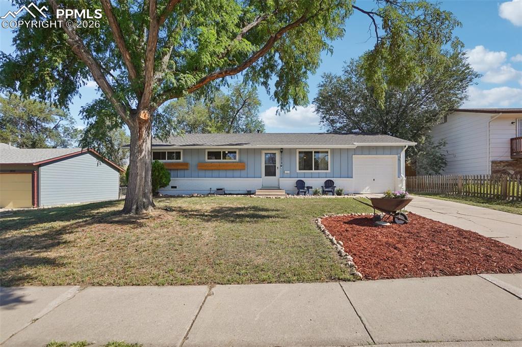 Welcome to this lovely ranch style home in a convenient location just minutes from I-25, shopping, parks and restaurants. The home boasts 3 bedrooms, 2 bathrooms and a 1 car attached garage with a spacious backyard. When you enter the home you'll notice the naturally lit living room with wood flooring that runs throughout the home. The living room flows into the open concept kitchen and dining room which comes equipped with an island, dual sink, granite countertops and updated appliances. Beyond the kitchen is a laundry/mudroom leading to the spacious backyard. Down the hall we have the cozy primary bedroom with an en suite 3/4 bath. Next to the primary bedroom is bedroom 2 and 3 which either one can double as an office space if needed. Near bedroom 2 and 3 is a conveniently located full bathroom. Come check this home out today!