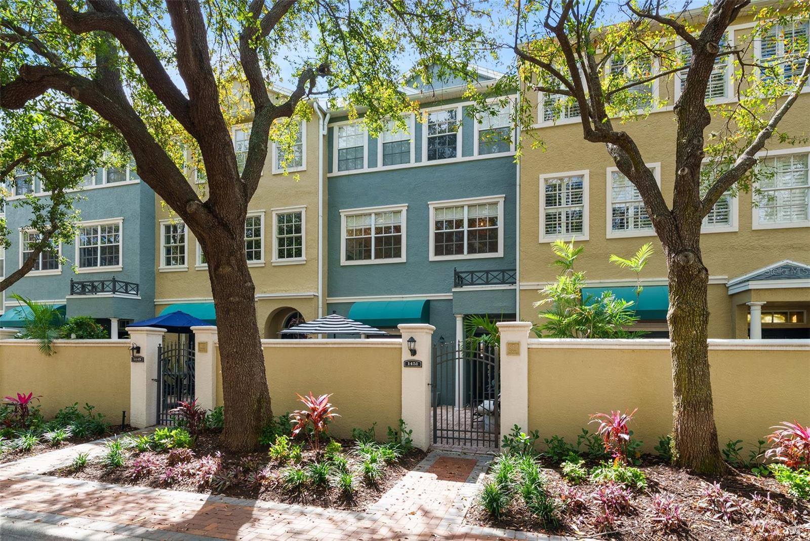 One of the rare homes on Harbour Island located in Flood Zone X, where flood insurance is not required, offering added peace of mind in one of Tampa’s most desirable neighborhoods.Welcome to 1451 Harbour Walk Road, a beautifully maintained townhome tucked within the tree-lined streets of Harbour Island. Offering 2 bedrooms, 2.5 bathrooms, and approximately 1,598 square feet, this residence features a thoughtful layout designed for both everyday comfort and effortless entertaining. The main living area is filled with natural light and flows seamlessly into the updated kitchen, complete with modern appliances, a custom breakfast nook, and a dedicated coffee bar that creates the perfect start to your morning. Stylish finishes and tasteful updates throughout the home add warmth and character while maintaining a clean, move-in ready feel. Upstairs, two spacious primary suites provide privacy and flexibility, each with its own en-suite bathroom, making the home ideal for guests, roommates, or a dedicated work-from-home space. Living on Harbour Island means enjoying one of Tampa’s most sought-after lifestyles. Residents have convenient access to waterfront parks, scenic walking paths, and the vibrant energy of nearby Water Street Tampa. From dining and entertainment to Lightning games at Amalie Arena and strolls along the Tampa Riverwalk, everything you need is just minutes away. With its prime location, desirable floor plan, and the added benefit of being located in Flood Zone X, this Harbour Island townhome presents a unique opportunity to own in the heart of Tampa.