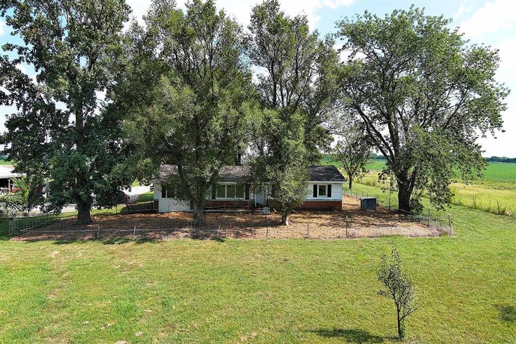 Your Escape Hatch is Open: Dreamy Farm Life on paved road with Serious Shop Space!
Tired of neighbors? Wish your "honey-do list" involved a lathe instead of lattes? Welcome to your +- 12 acres slice of peace and quiet, where you can trade city noise for the gentle murmur of a creek running right through your cross-fenced pasture!
This isn't your grandma's quiet little farm—unless your grandma was a boss babe industrialist. This property comes with a 4-bedroom home and a machine shop that means business with several generous bays. Think of the projects! Think of the toys! Think of the fact that your friends will stop asking to borrow your tools and just start hanging out here instead (you've been warned).
The Details that Delight (and Enable):
More than a garage—it's a multi-bay machine shop. Bring your welders, your wrenches, and your wildest engineering dreams. Plus, a separate workshop for the projects that need a little more focus (or a little less greasy metal dust).
12 acres \pm of elbow room. Cross-fenced pasture means your four-legged friends (horses, goats, or maybe just a really big dog) are ready for move-in. The creek is the ultimate nature soundtrack.
A sturdy barn for storage and livestock, and a specialized kennel (nesting) barn—perfect for the discerning breeder, animal enthusiast, or anyone who just needs a really nice spot to hide during family holidays.
This is more than a property; it's a lifestyle upgrade. Stop dreaming about that massive project you'd start if you just had the space, and come claim the peace and quiet you deserve. Your future self is already covered in grease and smiling.
Come see it before the guy who owns that really loud motorcycle does!
Interested in a private showing?
