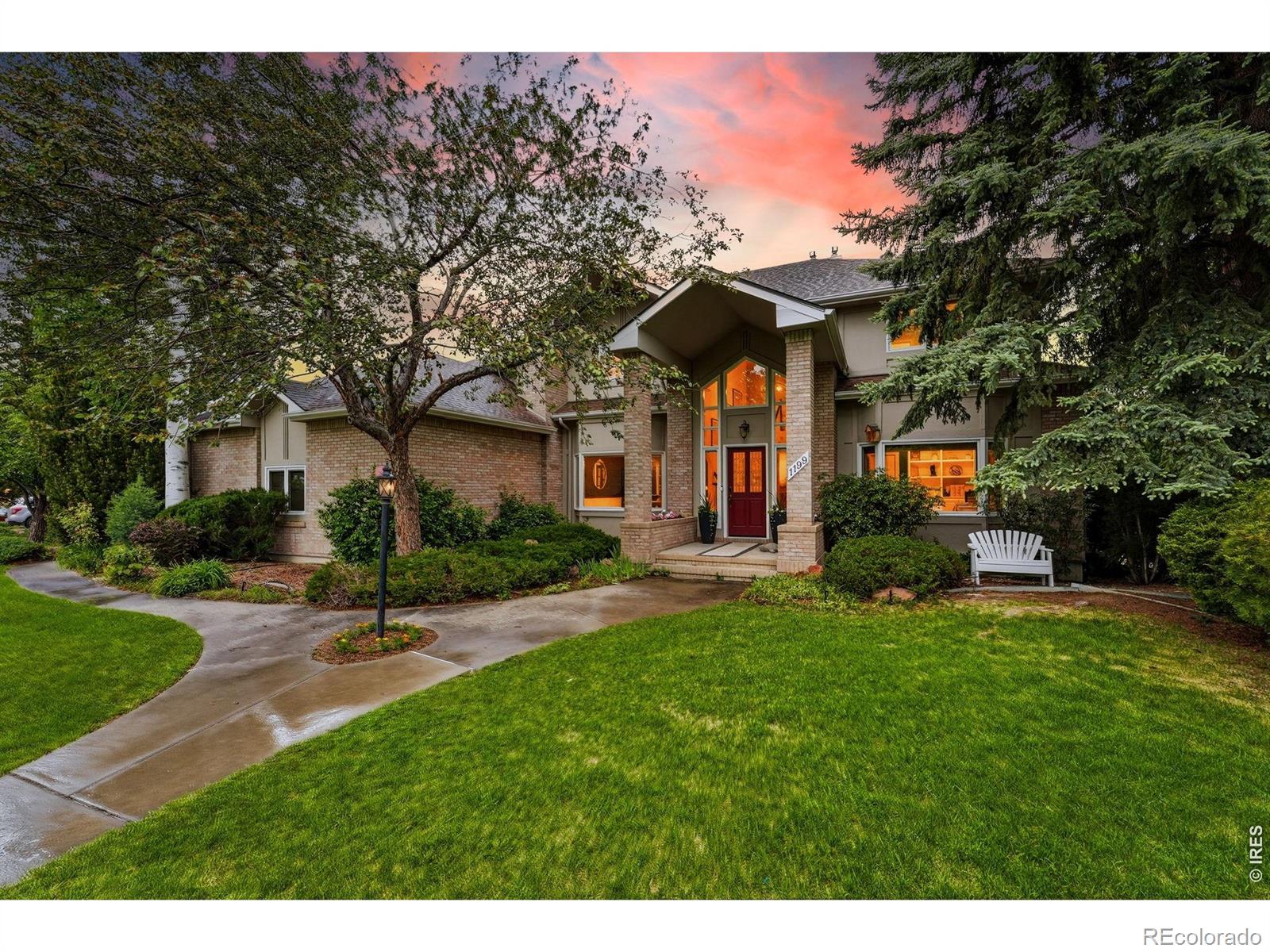 Located in Boulder's coveted Reserve neighborhood, this home is tucked away at its quietest end - directly adjacent to open space trails. More than 5,000 square feet across three spacious levels. The main floor lives the way Colorado homes should: rich hardwood floors, two separate living areas, a dedicated office, main-floor laundry, and new stainless appliances throughout. Abundant natural light pours through oversized windows across every sun-drenched level. Upstairs, four bedrooms and three baths including a junior suite, a Jack & Jill, and a primary suite with a private balcony and unobstructed Flatiron views. The finished garden level basement adds a rec room and a full one-bedroom, one-bath retreat - ideal for guests or multigenerational living. Outside, a private fenced yard and refinished deck - front row for Colorado sunsets. Steps from hiking and biking trails, the HOA's reimagined luxury pool, tennis, and pickleball courts. Fifteen minutes to Pearl Street, Michelin-recognized restaurants, the University of Colorado campus, and an easy commute to Denver.
