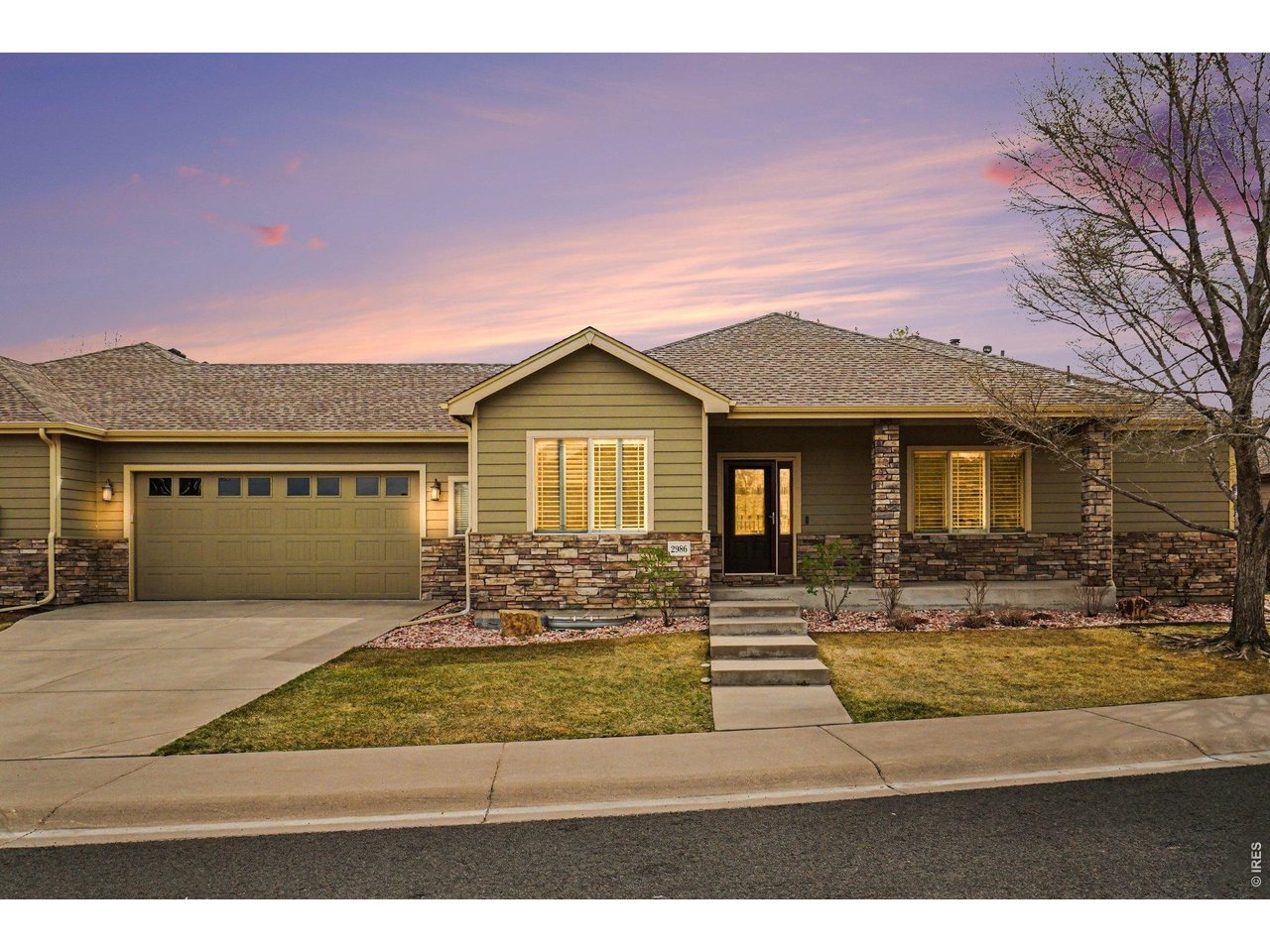 Ranch home in highly desired Seven Lakes Community. This meticulously remodeled ranch-style patio home offers a sophisticated blend of comfort and style. From the moment you cross the threshold, the home radiates warmth, greeting guests with an airy, open-concept floor plan bathed in natural light. At the heart of the residence lies beautiful wood floors and a true Chef's kitchen, boasting premium SS appliances, newly refinished custom taupe cabinetry, pantry and a sprawling granite island, perfect for both casual morning coffee and formal hosting in the adjacent dining area. The heart of the home features a sophisticated kitchen transformation, The main level is designed for effortless living, featuring a spacious primary suite that serves as a private sanctuary, complete with a spa-like ensuite and convenient main-floor laundry. Transitioning outdoors, the private, fenced backyard reveals a covered patio with power shades where you can unwind while enjoying peaceful views of the community's signature lakes. The home's footprint extends into a fully finished basement, an entertainer's dream featuring a generous recreation room and a family room anchored by a convenient wet bar. This lower level provides ultimate flexibility for guests with a dedicated bedroom and bath, plus a versatile third bedroom-finished with durable luxury vinyl flooring-that is ideal for a home gym, art studio, or craft room. A second, expansive laundry room creates an independent living space. An oversized garage with ramp access ensures every practical need is met. Beyond the property lines, enjoy a resort-like lifestyle with miles of scenic walking trails and tranquil water access. Experience the perfect blend of modern updates and timeless comfort in this beautifully refreshed residence. The interior has been completely revitalized with a designer-inspired neutral paint palette and plush new carpeting throughout, creating an inviting atmosphere from the moment you step inside.
