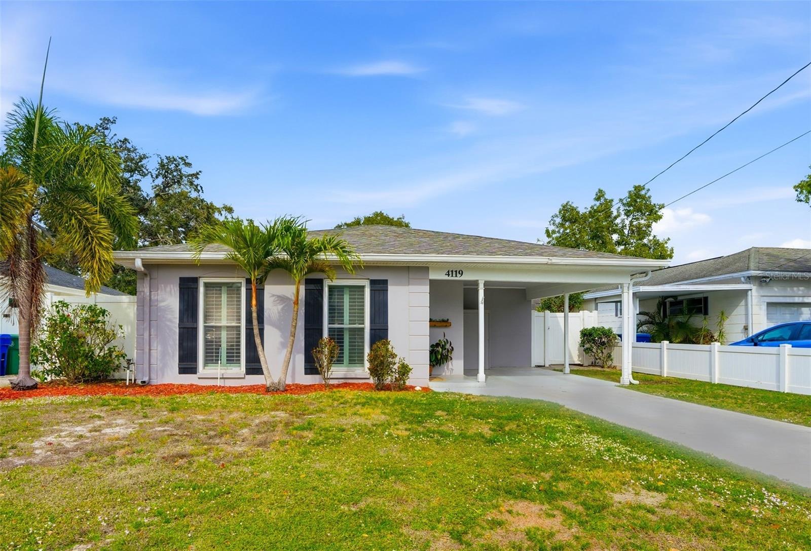 Located in the heart of Virginia Park, one of South Tampa’s most coveted neighborhoods, this home sits within the highly sought-after A-rated Mabry / Coleman / Plant school district and offers an exceptional blend of livability, location, and long-term potential.This thoughtfully laid-out residence features three bedrooms, two bathrooms, a bonus den, and a dedicated laundry room, all set on a solid block construction with slab foundation.  The home’s premium interior-of-the-neighborhood location places you just three short blocks from Friendship Park—a local favorite offering open green space, playgrounds for all ages, restrooms, and the perfect setting for afternoon or weekend playdates. Major system updates provide peace of mind, including a 2015 roof that presents like new, a water heater (2022), kitchen appliances (2022 or newer), full interior paint (2026), and professionally cleaned carpets (2026). Plantation shutters enhance the home’s character, and the exterior windows have been replaced, improving efficiency and natural light throughout. The property includes a single-car carport with an attached storage area, both positioned within the original roofline—creating a rare opportunity to easily enclose and convert to a one-car garage if desired. Upon entry, you’re welcomed by a functional foyer with a coat closet featuring a built-in combination safe. The family room and open-concept dining areas are anchored by large six-foot, front-facing windows, flooding the space with natural light. The kitchen is well-appointed with granite countertops, stainless steel appliances, white shaker cabinetry extending to the ceiling with crown caps, soft-close doors and drawers, tile backsplash, and under-cabinet lighting—a timeless and practical design. Just off the kitchen, a bonus room offers flexibility as a home office, gym, or creative space, with a conveniently located adjacent laundry room. Stepping out back you are welcomed with a paved walkway leading to a large pavered patio and a separate concrete pad with electrical primed for a hot tub to be added! All this with a fully fenced in backyard! What truly sets this property apart is its near-term and long-term new construction potential. Virginia Park is one of South Tampa’s fastest-growing neighborhoods for infill development, led by some of Tampa’s premier home builders. This property offers multiple paths forward: build immediately, enjoy as a starter home and build later, or purchase as a rental investment that can carry itself until redevelopment—all supported by pricing aligned with land-only comps. As the saying goes—location, location, location. This home is situated in a non-flood zone, has remained high and dry through the decades, and benefits from lower insurance costs. One of the best value opportunities currently available in Virginia Park. Don’t wait—schedule your private showing today.