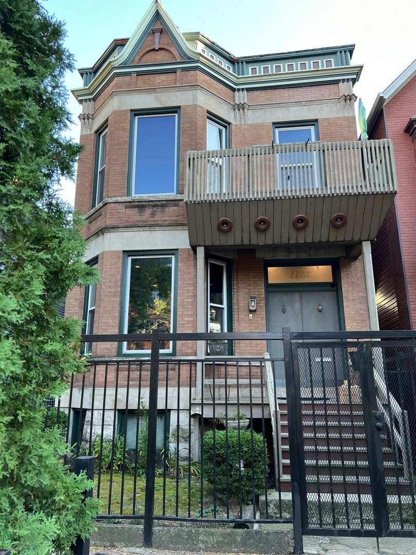 *LOCATION, LOCATION, LOCATION!** Discover the charm of this remarkable single-family home, which includes a desirable in-law suite that has successfully generated $35,000 to $40,000 as a lucrative Airbnb over the past year. This expansive 7-bedroom, 5-bathroom residence is ideally situated in the vibrant Wrigleyville neighborhood, offering a captivating direct view of Wrigley Field's iconic marquee right from your charming front porch.    As you approach, you'll appreciate the security and elegance of the gated entrance. Parking is convenient with a spacious two-car garage, ensuring you never have to worry about finding a spot. Step inside and be greeted by a wide-open living area bathed in natural light, perfect for entertaining or simply relaxing with family. The updated bathrooms add a touch of modern luxury to the home's classic charm.    Retreat to the tranquil master suite, where you can step out onto your private second-floor porch to savor the views of your quaint backyard ,for morning coffee or evening relaxation.     This home is ideal for larger families or those interested in renting out rooms while enjoying shared living spaces. If you're in search of ample space and a vibrant lifestyle, this property truly offers it all!