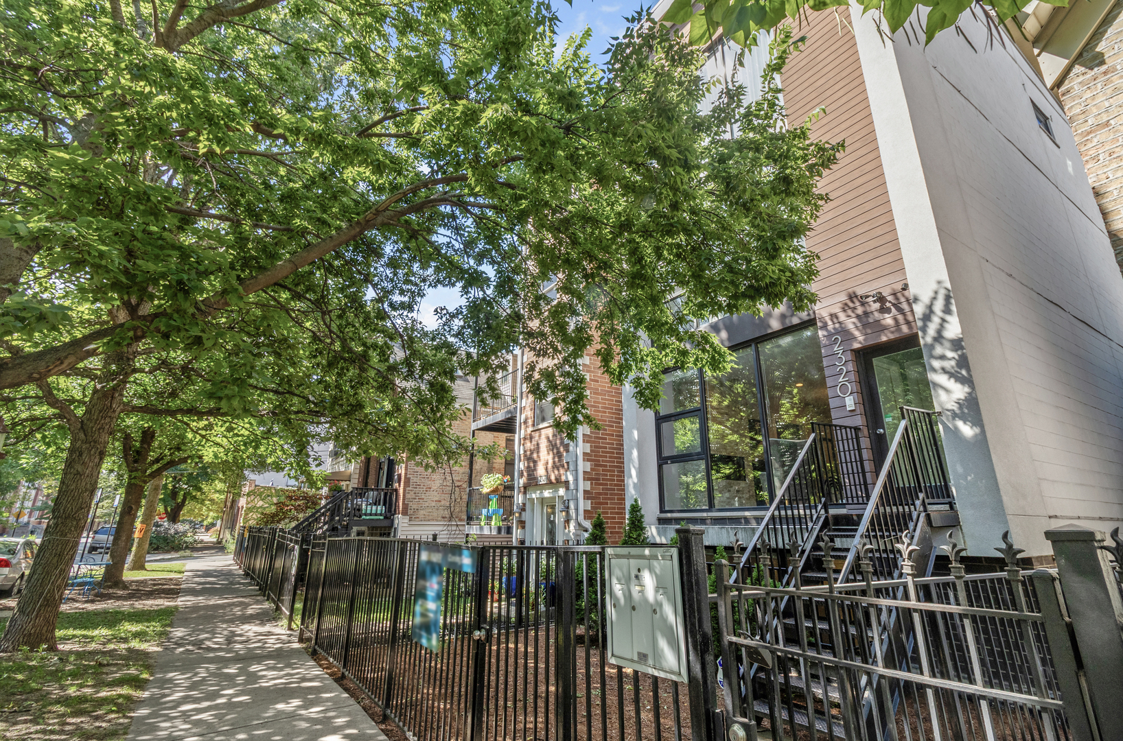 Nestled in the heart of prime Bucktown is this expansive and modern two-story duplex with exuberant amounts of light... and open concept space! Living room offers floor-to-ceiling windows, a cozy brick WOOD BURNING fireplace and generous ceilings. A kitchen/family room combo features the perfect place to entertain and relax, plus connects to the outdoor terrace. Stunner kitchen is outfitted with Quartz countertops, custom cabinetry, high end appliances, a full-length backsplash and has a large island plus ABUNDANT cabinet space. Downstairs you will find the primary suite with a spa-like bathroom complete with double vanity, soaking tub, and glass-enclosed shower.  It's a true oasis! Two other bedrooms, A DEN, and a laundry closet finish off the level. Both the primary and the second bathroom have operating heated floors. Outdoor living is a breeze with your private garage rooftop deck!  Easy-to-maintain turf was added to the common backyard in 2023.  Located on a tree-lined street just steps from Holstein Park, top-rated Pulaski International School, the 606 Trail, and all the restaurants, boutiques, and nightlife Bucktown has to offer. Very close to the expressway to make commuting and traveling a breeze! Half the garage is included in the offering since this is a special two-unit building.