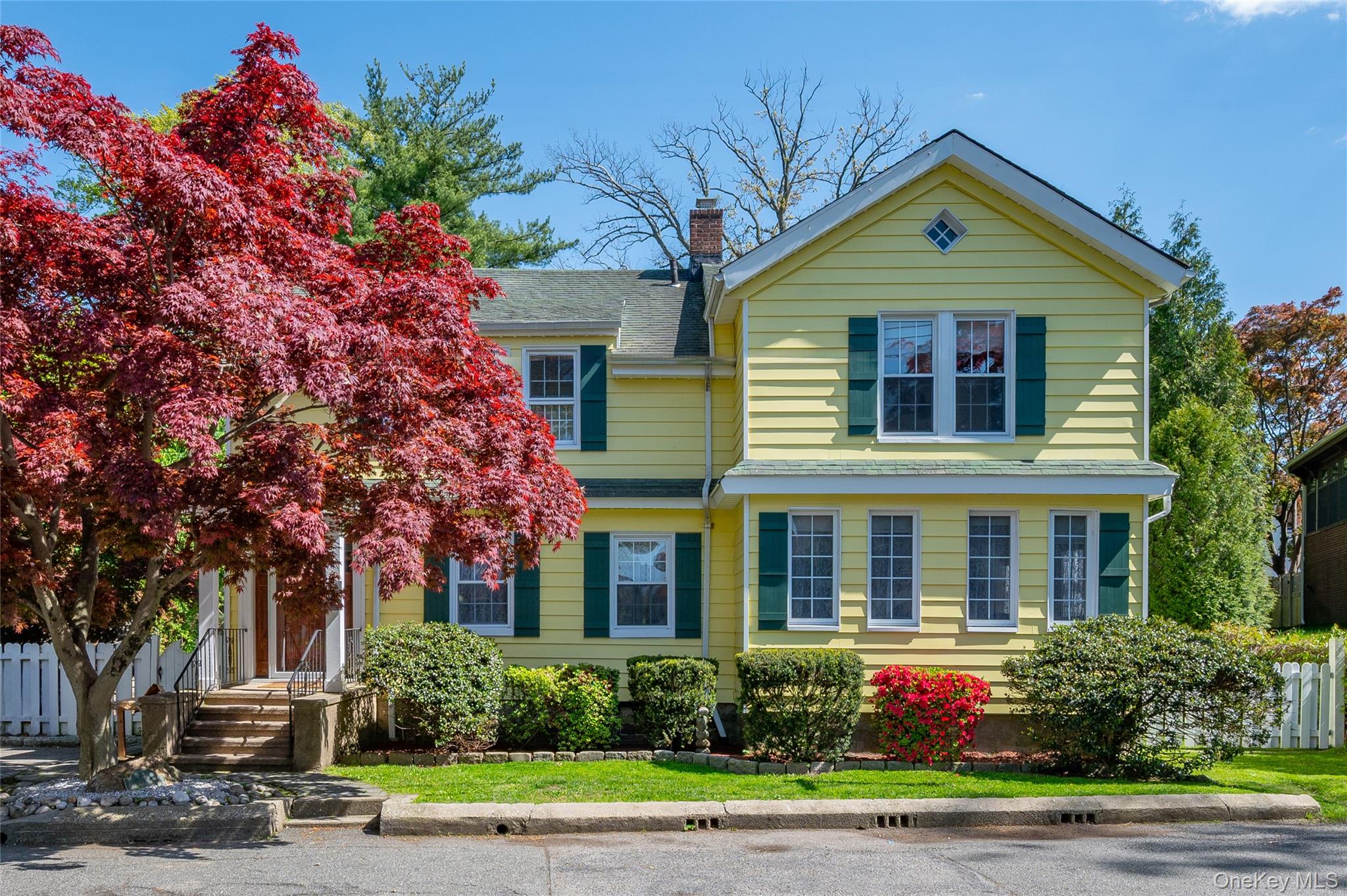 Tucked at the end of a quiet dead-end in sought-after Stephenson Park, this charming side-hall Colonial delivers space, updates, and a yard that begs for a barbecue invite list.The main level offers a formal living room with crown molding and a stone fireplace, a comfortable family room, an oversized eat-in kitchen.  Fresh paint brightens most rooms, while brand-new hardwood floors on the first level and new carpeting upstairs make moving in easy.The kitchen has been refreshed with updated cabinetry, stainless steel appliances, and new stone countertops. Sliding glass doors open to a generous Trex deck overlooking an expansive backyard with loads of room to run, garden, or simply relax.Upstairs you’ll find four well-proportioned bedrooms and a hall bath featuring a Jacuzzi tub.All this, plus a location near Metro-North and major highways, makes daily commuting refreshingly simple.A smart layout, tasteful improvements, and a peaceful setting — this one checks so many boxes