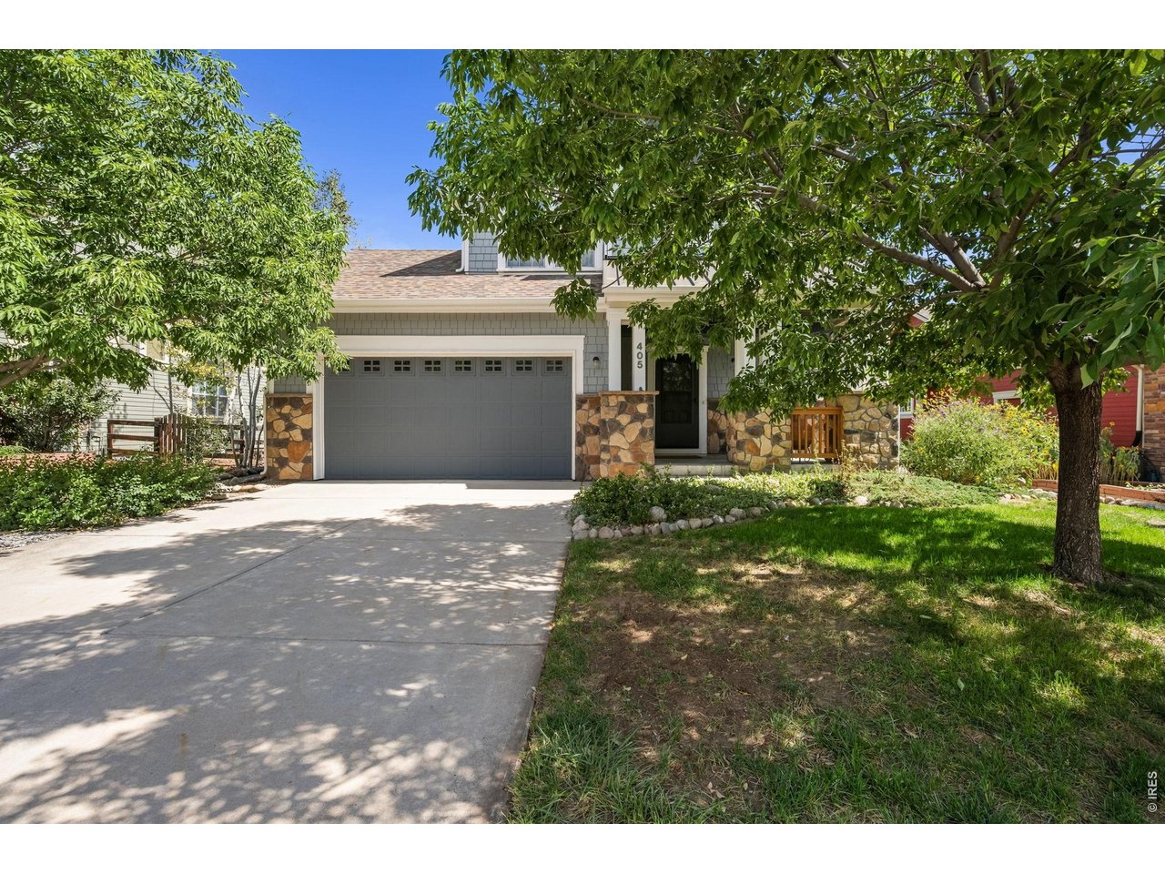 LOWER YOUR RATE! Buyer receives a FREE 1-0 interest rate buydown when financing with our preferred lender enjoy a lower monthly payment your first year! Terms apply. Lyons sits where the mountains meet the river -and this remodeled 5-bedroom, 4-bathroom home in Lyons Valley Park puts you right in the middle of it. Downtown Lyons, the St. Vrain River, and some of the region's best hiking and mountain biking trails are all just minutes from your door. While Longmont, Boulder, and I-25 remain close enough for an easy commute or night out. The home itself has been fully refreshed to match: a completely remodeled kitchen with new cabinets, countertops, and oven, a central island, a beverage bar, and a dedicated appliance cabinet for effortless entertaining. Refinished hardwood floors, new carpet, and fresh paint carry the updates throughout. The open main level centers on a gas fireplace and flows straight into the kitchen's new layout. The finished basement adds two more bedrooms, a 3/4 bath, and a cozy secondary living area. A 3-car tandem garage, partially fenced yard with wood burning fire pit, and deck with foothills views complete the picture. Lyons Valley Park itself offers sidewalks and a common recreation area on a quiet cul-de-sac - the kind of setting where small-town, riverside life doesn't mean sacrificing access to everything else the Front Range has to offer.