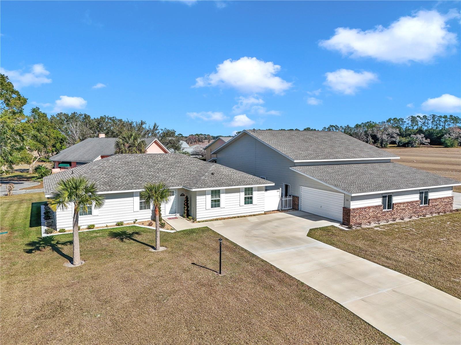 REDUCED almost $200,000. Now is the time to consider it. Pilots, don't dream about it, live it! In Leeward Air Ranch (FD04). One of America's favorite private sport aviation communities. Your 65 acre backyard playground is a 6200’ x 165’ lighted, stabilized, reinforced, all-weather VFR runway. Mac McClellan of Flying Magazine calls it "... the most perfectly constructed and maintained turf runway...". Your new gated, active flying community here in Central Florida offers about 300 flying days a year, and almost 200 hangar homes and aircraft call it home. Think warbirds, antiques, classics, light sports, home-builts, kit planes, aerobatics (ask about IAC practice area!), amphibs, helicopters, gliders, and the list goes on. EAA, IAC, QB, Warbirds of America, 99's, Humble Squadron, Florida Aero Club, Florida Antique Biplane Association, Intl 180/185 club, Angel Flight Southeast. Fly-ins, fly-outs, warbird roundups, aviation days, Aerobatic demo days, Friends and Family Breakfast. Active casual social environment with happy hours, movie nights, many holiday events, light up Leeward parade. Motorcycle rides, bridge club, poker nights, etc. Meet your new lifelong friends at the famous "Red Barn". Restaurants, shopping, access to health care nearby. The 2024 almost new home features 3 bedrooms 2 baths with over 1720 LSF. 72'x 40’ older hangar features 48’ x 40’ aircraft area (invite the neighbors over to enjoy the movie projector casting a 20’ image on the wall, sectional couch included!), 420 LSF 1 bed/1 bath guest apartment, 20’ x 40’ garage/shop area, plus utility room. House has spray foam insulation under roof deck, R-19 in walls. Hangar has R-11 in walls and ceiling. Owner spent under $1,500 on utilities and under $1900 on insurance for all of 2024! Current Pilot's certificate and aircraft ownership required to purchase property in community (ask for details).