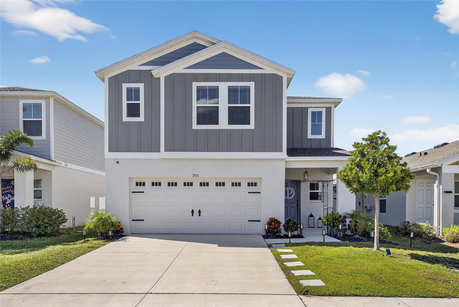 Welcome Home to Modern Living in Wesley Chapel! Step into this beautiful 5-bedroom, 3-bath home perfectly designed for both comfort and style. The open-concept layout fills the home with natural light, creating an inviting flow between the living, dining, and kitchen spaces—ideal for family gatherings or entertaining guests. The chef-inspired kitchen features quartz countertops, designer recessed panel cabinets, and stainless-steel appliances including a microwave, dishwasher, and range. Luxury vinyl plank flooring throughout the main living areas adds durability and elegance, while the bathrooms showcase matching quartz countertops for a clean, modern finish. Enjoy energy savings and year-round comfort with solar panels which eliminate the cost of an electric bill, energy-efficient double-pane Low-E windows, and a Carrier® ecobee™ SmartThermostat Pro with voice control—all designed to keep utility costs low and comfort high. Step outside to a fully fenced backyard—perfect for pets, little ones, and outdoor gatherings. The home also features a screened-in patio and cabana, providing the ideal setup for relaxing or entertaining while enjoying the Florida weather in comfort and privacy. Located in a vibrant and fast-growing area of Wesley Chapel, this welcoming community includes a resort-style pool, dog park, and playground, offering something for everyone in the family. Conveniently close to The Shops at Wiregrass, Tampa Premium Outlets, and a variety of dining, entertainment, and healthcare options. Families will appreciate nearby A-rated schools such as Wiregrass Ranch High School and Dr. John Long Middle School. Wesley Chapel continues to be one of Tampa Bay’s most sought-after and up-and-coming communities, blending modern living, family-friendly amenities, and unbeatable convenience. This move-in-ready home truly has it all—style, efficiency, and comfort inside and out!