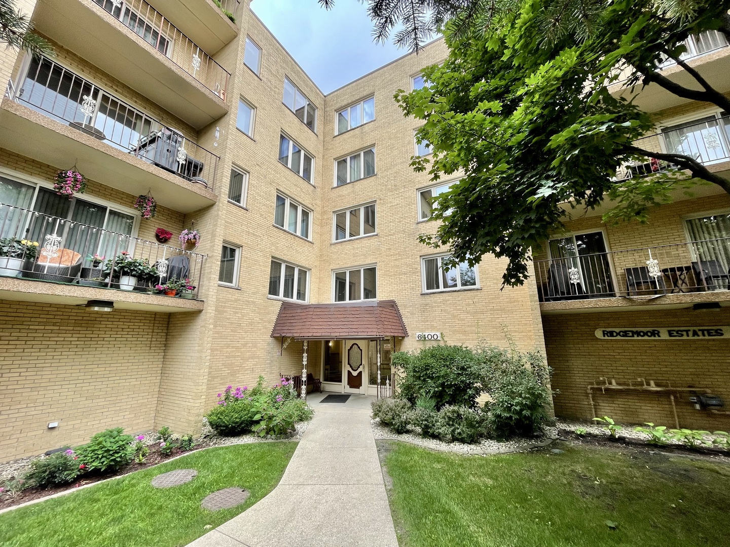Super rare top-floor 2 BED 2 BTH corner unit with double exposures and an extra window in the main living area, flooding the space with natural light. This stunning, fully updated home feels like a page from Architectural Digest, featuring an open-concept kitchen with brand-new stainless steel appliances, a sleek center island, granite and ceramic finishes, and a striking backsplash. Custom ZEBRA shades. Engineered hardwood floors run throughout, complemented by modern baseboards, drywall ceilings (no exposed concrete), LED recessed lighting, and a built-in surround sound speaker system. The spacious primary suite offers ample storage and a dramatic ensuite bath with custom ceramic tile and walk-in shower, while a second full bathroom adds elegance with updated finishes. Additional highlights include in-unit laundry, newer energy-efficient casement windows, freshly painted walls, brand-new balcony carpeting, a well-maintained furnace, completely rebuilt A/C, indoor heated parking space (#39), and same-floor storage (#39) bike rack storage in garage. A truly stylish, immaculate, and move-in-ready home-schedule your showing today!