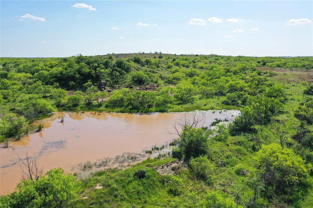 Scenic 48 acres located on FM 175 and Bowen Loop in northwest Jack County. The property has frontage on all three sides. Vast vista from the significant elevation provide for beautiful homesites. The property has one stock tank and a set of working pens. There is electricity on the north side of the property running along Bowen Loop. Ag Exempt. 

Minerals: No active production on the property. The owners believe to own 0.333 of the minerals and are conveying half (.166 of the total) of the minerals they believe to own. 

If cooperating broker-agent is not present during initial contact, showing(s), and-or negotiations, cooperating broker-agent will not be entitled to full cooperating-compensation fee, with the cooperating-compensation fee being at the sole discretion of Maddox Realty.