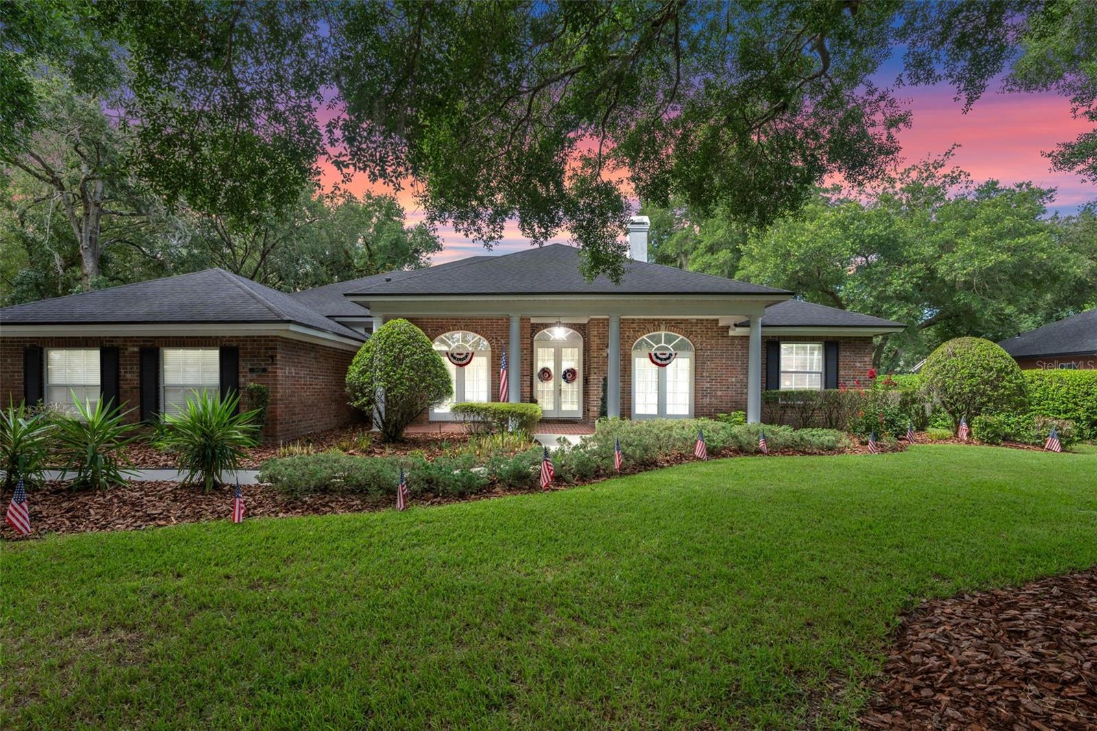 Welcome to this stunning full-brick custom home located in the heart of East Orlando, where you'll discover the perfect blend of elegance and comfort. Boasting four bedrooms, three bathrooms, and a three car garage this home features formal dining and living rooms, offering everything you need—and more! As soon as you step inside, you’ll be greeted by a spacious open floor plan with soaring ceilings that create a bright and airy atmosphere. To your right and left are the formal dining and living rooms. Straight ahead, you'll find the expansive family room. The kitchen features built-in Frigidaire appliances and a large L-shaped quartz island with an eating area and breakfast nook, all overlooking the living room. There are countless upgrades, including a gas cooktop, A/C system, outdoor grill, and fireplace.The primary suite includes a walk-in closet, dual L-shaped vanities, a Jacuzzi tub, and a massive step-in shower. Step outside into your oversized covered oasis—the patio offers a gas grill and exceptional landscaping, perfect for grilling with the family or simply relaxing. Location is ideal—just minutes from Waterford Lakes Plaza, University Boulevard’s fantastic restaurants, UCF, and Blanchard Park, which features a picturesque 3.1-mile riverfront conservation area perfect for kayaking, fishing, biking, or brushing up on your tennis skills! Easy access to 417 and Highway 50. Schedule a showing today before it’s gone!