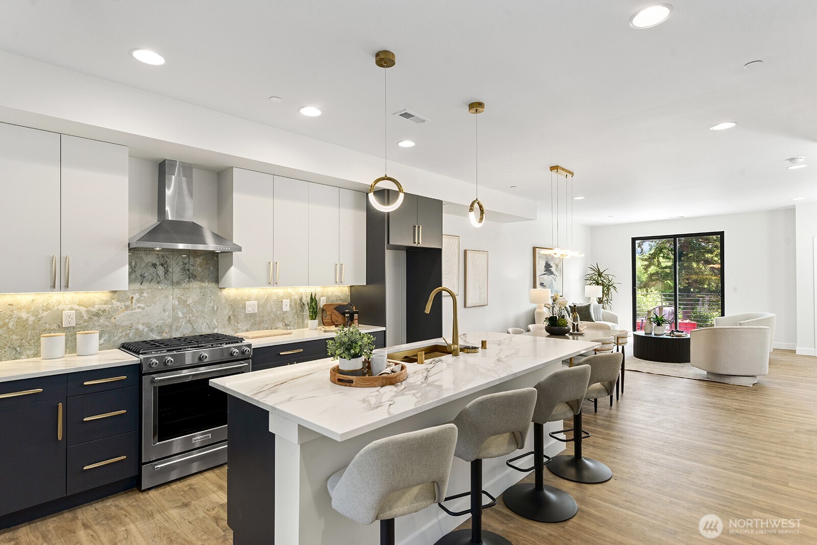SPECIAL BUILDER FINANCING INCENTIVE! Rates from 2.875%! (2.875% rate for 1st year using 7/6 ARM. Subject to restrictions.) Welcome to Tambark15 by MSR Communities; a contemporary collection of 15 new construction townhomes in Bothell, WA. This thoughtfully designed community is steps from peaceful Tambark Creek Park, along w/ protected growth area behind. Plan 2119 features MSR's signature light-filled, open design along with a guest suite on entry-level & office on main floor. Primary suite & 2 additional beds on upper floor. Luxury finishes thru-out including 3cm Quartz counters, full-height Porcelain tile backsplash, LVP flooring. Smart home features: Cat-6 wiring, outlets w/ USB charging, pre-wiring for EV charger in garage, & Ring doorbell system. Utilize the 2-car, side-by-side garage with additional driveway parking spaces. Plenty of room for you and your guests. Near top-rated schools, lively Mill Creek Town Center, & quick access to I-405. Tambark15 perfectly accommodates your lifestyle: working, living, and relaxing. Home is waiting at Tambark15. Buyer Broker & Customer registration policy: Buyer’s Broker must be registered as the buyer's broker of record on the buyer’s 1st visit to receive the offered commission or commission is reduced. Model home is located in Unit A1.