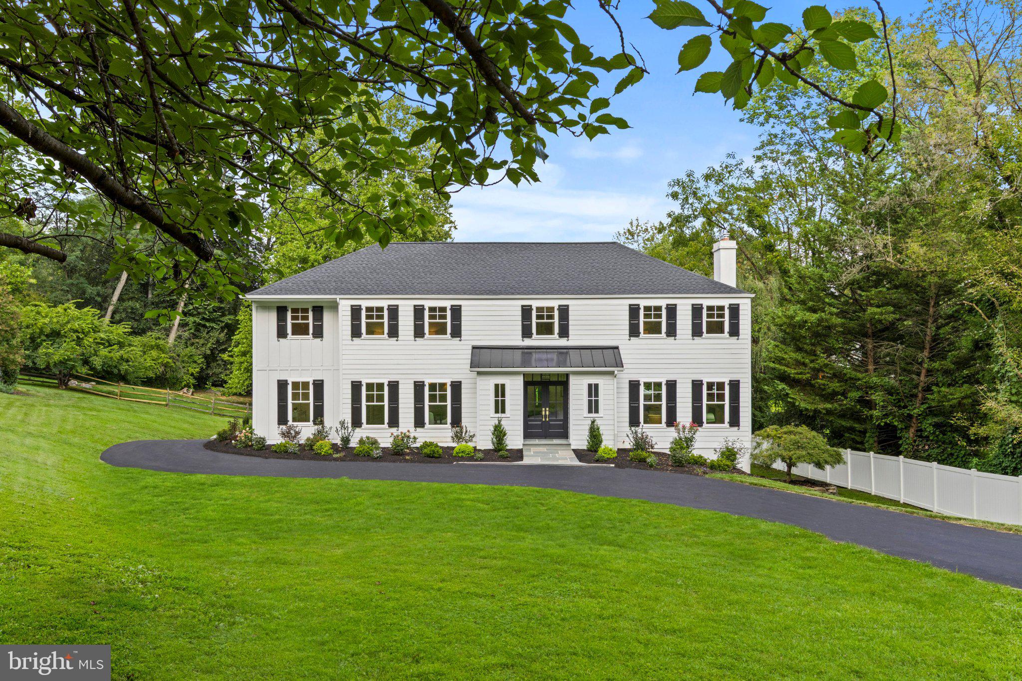 RARE FIND! Completely remodeled 5-bedroom, 4.5-bath two-story Colonial in the coveted Radnor School District (Ithan Elementary), offering a sophisticated total renovation thoughtfully designed for today’s luxury lifestyle. Tucked away on a quiet cul-de-sac, this stately home offers exceptional curb appeal with beautifully reimagined exterior finishes, including Hardie plank siding, new roof, shutters, windows with SDL grilles and professional landscaping. An expanded, repaved driveway with elegant flagstone front and side walkways, welcome you home. A whole-house generator provides added peace of mind. Enter through new Therma-Tru double entry doors with a glass transom into beautifully appointed spaces with generous proportions and seamless flow. Newly refinished hardwood floors, a redesigned elegant staircase, custom millwork, new interior and exterior doors and trim, and designer finishes elevate every room. The foyer features a large coat closet and formal powder room with grasscloth wallpaper and marble sink. The sun-filled front-to-back family room provides a wonderful gathering space centered around a new gas fireplace, with room for casual dining. A glass-paneled door leads to a custom Trex deck with decorative TimberTech railings overlooking the expansive, private backyard, creating the perfect setting for entertaining and everyday enjoyment. The family room opens to the spectacular chef's kitchen featuring custom white ceiling-height cabinetry and a stunning island with double-thick Calacatta quartz countertops seating five. A six-burner Wolf range, 42-inch paneled Sub-Zero refrigerator, paneled Bosch dishwasher, Calacatta quartz backsplash and statement lighting complete the space. The custom butler's pantry offers extensive storage, glass-front cabinetry, beverage refrigerator, ice maker, sink with disposal, pull-out trash, Calacatta quartz counters. The nearby formal dining room is enhanced with designer sconces and chandelier, while a cozy den with a triple window offers beautiful treetop views. A dedicated home office is tucked off the mudroom for a private workspace. The large laundry room includes custom cabinetry, utility sink and storage closet with ample shelving. The mudroom features custom built-ins, an additional coat closet and side-door access, and can be closed off with a hidden pocket door.Upstairs, the newly expanded primary suite features two oversized walk-in closets, one with a window and laundry hookup, and a stunning spa-inspired marble bath with fluted double vanity, soaking tub, walk-in shower and separate water closet. An impressive ensuite bedroom offers a private bath with marble floor, oversized shower, large vanity and walk-in closet. A large southwest-facing corner bedroom enjoys abundant natural light and a walk-in closet with floor-to-ceiling shelving. The fourth spacious bedroom overlooks the park-like front yard. A hall bath with marble flooring, double vanity and extra-large tub/shower serves these bedrooms. All upper-level vanities feature built-in plugs and dedicated storage for hair tools. The newly finished walkout lower level with 9-foot ceilings adds exceptional living space with a large recreation area ideal for a media room and game room. New Luxury Vinyl Plank flooring, large windows and a full glass-paneled door provide natural light and backyard access. A fifth bedroom and fourth full bath with marble flooring and walk-in shower create an ideal guest or au pair suite. A second mudroom with built-in bench, sports storage closet and direct access to the attached rear two-car garage adds convenience. Beautifully renovated from top to bottom, this exceptional Radnor residence offers a rare blend of luxury, comfort and convenience. Ideally situated near renowned private schools, country clubs, and the shopping and dining destinations of Wayne and Bryn Mawr, with convenient access to major arteries, regional rail and Amtrak service to New York.
