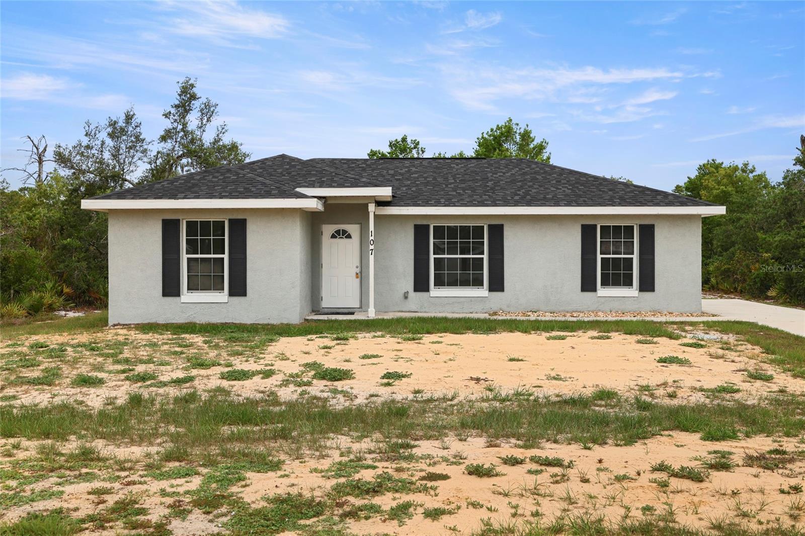 $2500 SELLER'S CREDIT TOWARDS A STORAGE SHED, ASK YOUR AGENT FOR DETAILS! Move right into this beautiful 2022 concrete block home located in the desirable Placid Lakes community. This thoughtfully designed 3-bedroom, 2-bath residence offers a bright and modern open-concept floor plan featuring vaulted ceilings, oversized tile flooring throughout, recessed lighting, and abundant natural light. The stylish kitchen showcases white shaker-style cabinetry, sleek countertops, stainless steel appliances, ample storage, and an open layout perfect for entertaining and everyday living. The split-bedroom floor plan provides privacy for the owner's suite while offering comfortable accommodations for family and guests. Both bathrooms feature contemporary tile finishes and modern fixtures, creating a clean and elegant feel throughout the home. Situated on a spacious ¼-acre lot with no immediate neighbors on either side, you'll enjoy added privacy and peaceful natural surroundings. Additional features include central water service, a newly installed drain field, and a concrete driveway. As a property owner in Placid Lakes, you'll enjoy exclusive access to Lake June-in-Winter through August Tobler Park, featuring a boat ramp, picnic facilities, fishing, boating, and one of Highlands County's most sought-after recreational lakes. Conveniently located near downtown Lake Placid, you'll enjoy nearby lakes, nature trails, local dining, shopping, and the relaxed Florida lifestyle year-round. This property could be your forever home, a vacation getaway, an income producing opportunity, or a retirement dream-the choice is yours!