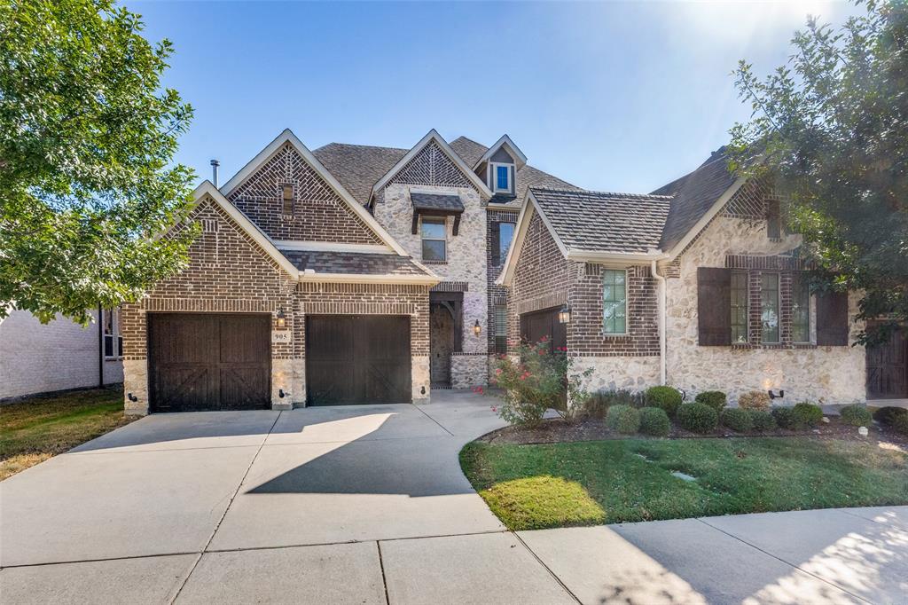 This impressive home combines thoughtful design with comfortable elegance and outstanding attention to detail. Great curb appeal and well-kept landscaping welcome you inside, where hardwood floors, plantation shutters, and vaulted ceilings create a bright, open feel. The spacious living room features a gas fireplace and flows seamlessly into the dining area and chef’s kitchen. The kitchen showcases quartz countertops, an oversized island, commercial-grade gas range with vent hood, stainless steel appliances (including the refrigerator), decorative backsplash, and a built-in wine cooler—perfect for entertaining or everyday living. A built-in desk sits just off the kitchen, and the main floor also includes a secondary bedroom with en-suite bath and walk-in closet. The private primary suite offers vaulted ceilings and French-door entry into a spa-inspired bath with dual vanities, a large walk-through shower with body sprays, and an expansive custom closet. The utility room includes quartz counters, built-in cabinetry, a sink, and comes with the washer and dryer. Upstairs features a large game room, an office with French doors, a media room, and two generous secondary bedrooms—each with its own private bath. The backyard includes a covered patio and 8-foot privacy fence. In addition to the two-car garage, there is a separate single garage with exterior access—ideal for a workshop, hobby space, or additional storage. Additional highlights include a whole-home water softener and reverse osmosis system. With a jogging trail and extra parking directly in front, plus easy access to I-75 and Waters Creek Village, this home perfectly blends luxury, comfort, and convenience.