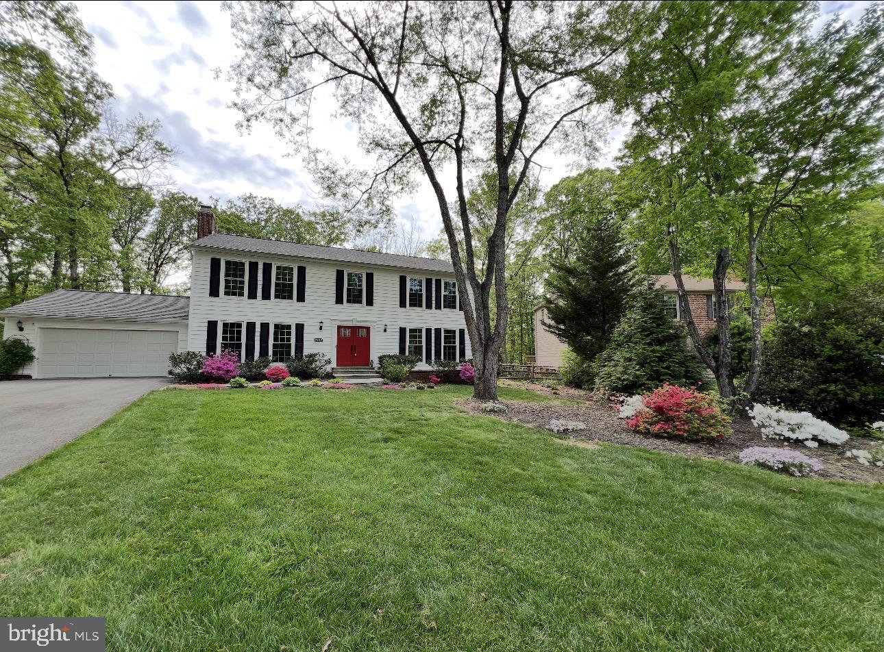 Beautifully updated 4-bedroom, 2.5-bath home offering space, comfort, and modern upgrades throughout. The renovated bathrooms feature new toilets, vanities, flooring, showers, and fixtures, while fresh paint and brand-new carpet give the entire home a crisp, move-in-ready feel.The updated kitchen shines with new countertops and stainless steel appliances, making it perfect for everyday living and entertaining. Hardwood floors on the main level and durable LVP flooring in the fully finished basement add both style and functionality.Enjoy multiple living spaces, including a cozy fireplace, a spacious lower level, and a large laundry room with built-in cabinets. The oversized two-car garage provides ample storage.Step outside to a screened-in, maintenance-free porch and patio overlooking a fully fenced, flat yard—nearly half an acre—ideal for relaxing, playing, or hosting gatherings.Located in a community with access to Reston amenities, this home combines comfort, convenience, and lifestyle.  Don't Miss This One. Offer deadline  5/4/2026  at Noon