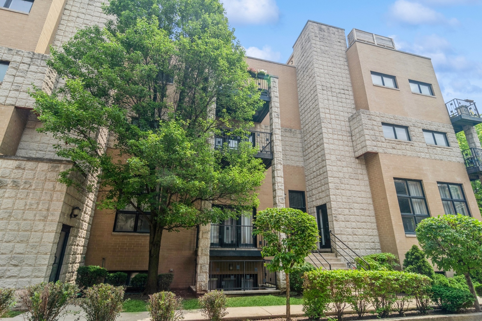 BUYER'S FINANCING FELL THROUGH LAST SECOND -this was due to close in a week! Top floor Wicker Park condo is truly elevated by its massive PRIVATE rooftop deck, designed for entertaining with panoramic skyline views and room for dining, lounging, and more-making it the standout feature of this unit. Inside, the spacious 2bed, 2bath layout offers sun-drenched, open concept living with beautiful hardwood floors, a well equipped kitchen with quartz countertops and stainless steel appliances, built-in dry bar, gas fireplace, and an additional private balcony off the living room. The primary suite includes a full en suite bath and generous closet, while both bedrooms are bright and airy. Additional conveniences include in-unit laundry, ATTACHED GARAGE PARKING, and extra storage. Set in a secure boutique building just two blocks from the Damen Blue Line-even closer to Wicker Park's best restaurants, shops, and nightlife-this gem is a rare blend of city convenience and rooftop charm.