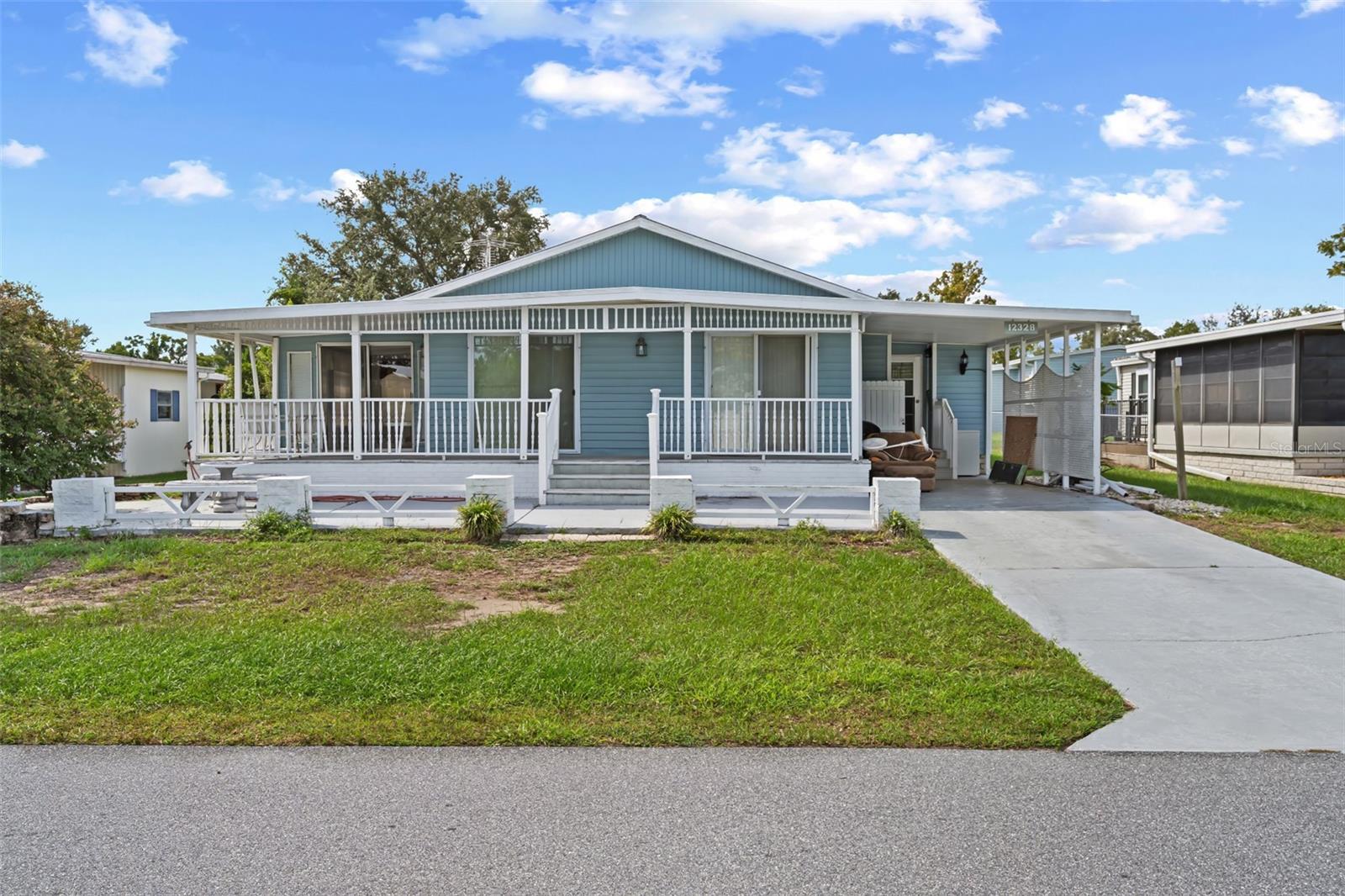 Lovely 2 Bedroom, 2 Bathroom mobile home in High Point, a sought-after 55+ community where HOA fees are just $45/month. This bright, airy home features an inviting open front porch and a comfortable layout ready for your personal touch. Located just 15 minutes from the Gulf, with easy access to beaches, shopping, dining, hospitals, and more. High Point residents enjoy access to an 18-hole golf course, solar-heated pool, tennis, pickleball, shuffleboard, bocce ball, horseshoes, cornhole, dog park, RV storage, and a lively community center with dances, concerts, card nights, and exercise classes. No CDD. Tampa airport and top attractions are just a 45-minute drive away. Whether you're retiring or snowbirding, this home offers comfort, convenience, and a wonderful community.