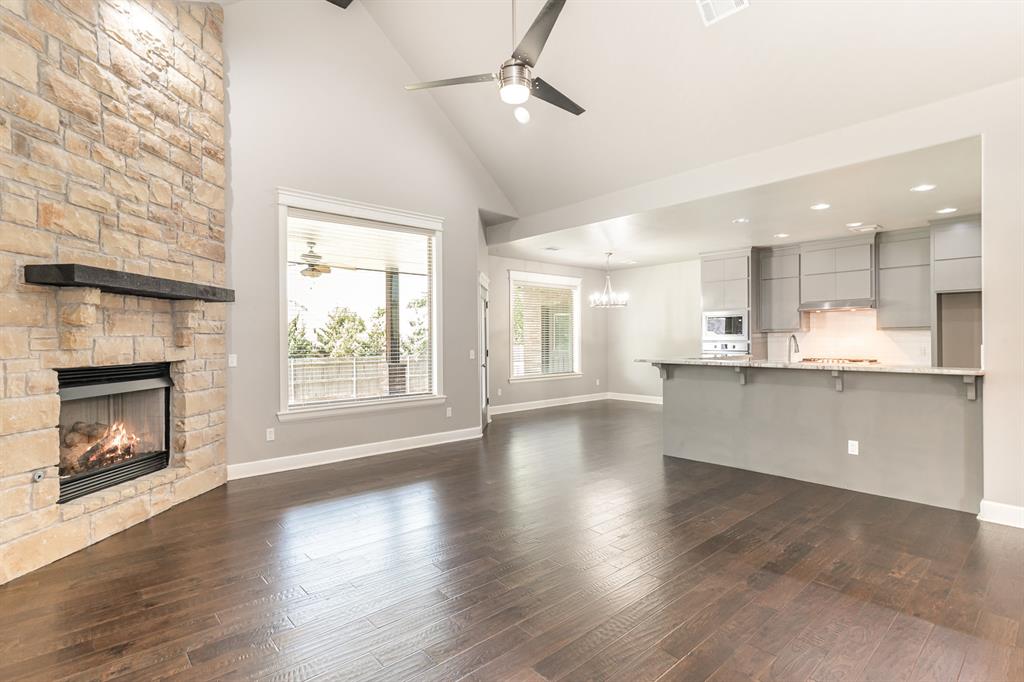 Your dream home awaits you, on the cusp of the vibrant college and tech scenes, yet close enough to accomplish all of your errands and store runs with time to spare! Commutes are nothing compared to city life elsewhere with campus drop offs in 15'ish minutes, major shopping and eateries are 2-20 minutes in all directions, museums in 10 minutes, Lake Thunderbird in 15 minutes and a National Weather Center in a few minutes! A stunning residence such as this offers a versatile layout for all! With a welcoming study or 4th bedroom of the entry, this room features a walk-in closet and a uniquely stylish and stained wood accent wall. Enjoy some open concept living bathed in natural light, highlighted by a stone accented fireplace with mantle, wood look floors flowing into dining and kitchen areas. Kitchen boasts updated stainless cooking, 5 burner gas cooktop, cabinets for days, breakfast bar area, granite, and a walk-in pantry! Dining area is ideal for entertaining or enjoying a relaxing night! Wall enclaves greet you on your way to this primary suite! A barreled vault ceiling with wood accents delights you, a patio retreat soothes you, and multiple layout and sitting area options creates a feeling of luxury! En suite includes dual vanities, framed mirror, powder space, exquisite brushed nickel fixtures, elegant soaker tub, and a true walk-around shower! Pass through a generous walk-in closet to access your laundry area! No more excuses! Additional guest beds include ceiling fans and the secondary bath is also blessed with two vanities and shower-tub! The 5th bed, bonus, or game room is situated upstairs with a mini-split, walk-in closet, and full bath! Ample patio space and an incredible built-in grill complete your outdoor living! This home is perfect for relaxation and entertaining, along with a true 3-car garage! Don’t miss out on this once in a lifetime opportunity! Take advantage of the video and 3D tours before your private viewing! This dream home is yours!