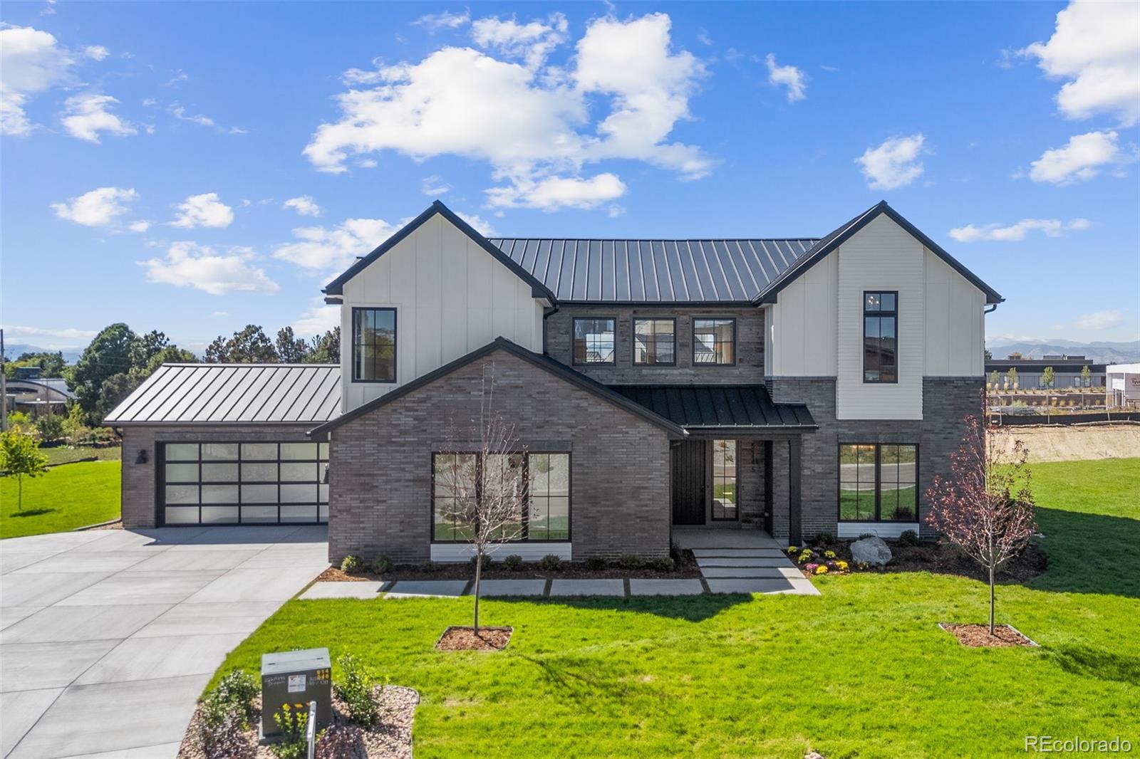 Welcome to 5145 S Kearney Court—an extraordinary new custom home by Steven Luber Custom Homes, set on the most coveted lot in Greenwood Village’s exclusive West Village enclave. This west-facing, flat ¾-acre site offers expansive mountain views and endless potential for outdoor living—ready for your dream pool, outdoor kitchen, or sport court. Homesites of this caliber are rare—especially paired with a home of this distinction in such a prime location.Inside, over 6,000 finished square feet span three thoughtfully designed levels. The 7-bedroom, 7-bath layout blends openness with comfort—soaring ceilings, abundant natural light, and generous proportions create a sense of volume, while smart transitions make the home feel intuitive and connected. Whether hosting a lively gathering or enjoying a quiet evening in, the space adapts beautifully with an effortless flow to the outdoors.Built by Steven Luber, one of Denver’s most respected luxury builders, this home reflects over 30 years of experience in craftsmanship and design. Known for timeless architecture and enduring quality, Luber homes are built to last—and designed to live in. Every element was curated to elevate your lifestyle without sacrificing warmth or functionality.Located in West Village, a boutique community of newer custom homes just south of Belleview Avenue, the neighborhood offers peace and privacy while keeping you close to everything. You're minutes from the Denver Tech Center, I-25, Belleview Station, and The Landmark. Enjoy proximity to top-rated Cherry Creek schools, scenic trails along the High Line Canal, neighborhood parks, and preserved open space.5145 S Kearney Ct offers a rare blend of architectural quality, location, and long-term value in one of Colorado’s most prestigious zip codes.This is more than a home—it’s a legacy in the making. Is this your forever home?