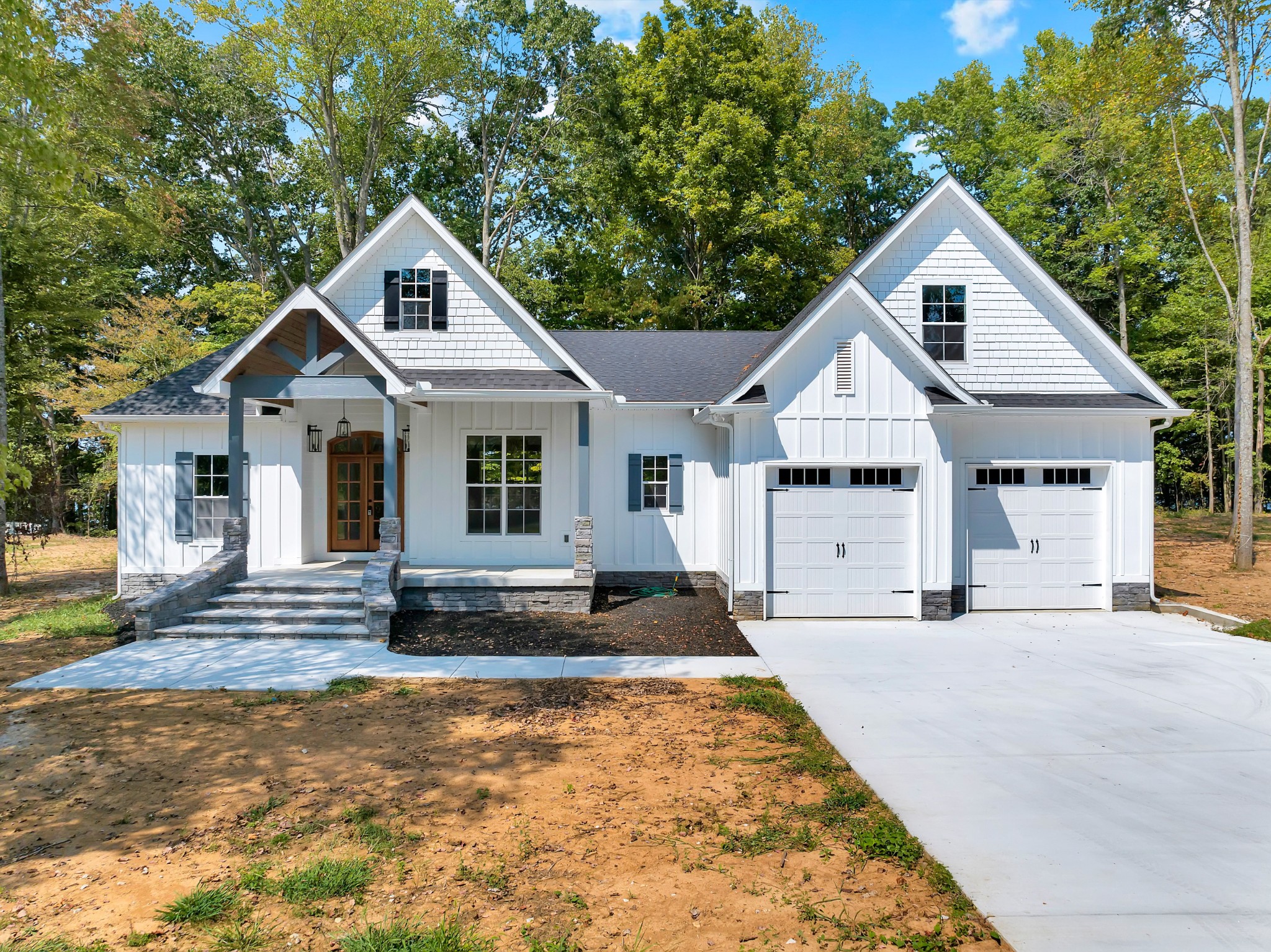 Welcome to this elegant custom-built home on Woods Reservoir! This one-level beauty was thoughtfully designed to combine everyday comfort with breathtaking views of the lake. Custom cabinets with soft close doors, gleaming hardwood, marble, and decorative tile flooring. The gourmet kitchen features a butler pantry, and a unique sink with a glass washer. You will also find a wet bar in the formal dining room.  Natural light pours through expansive windows, filling the open spaces with warmth. Retreat to the primary suite and wake up to peaceful lake views each morning or unwind on the spacious deck as the sun sets across the water. Upstairs you will find an expansive bonus room, great for a theatre room, playroom, office, etc.  With upscale finishes and a floor plan made for both entertaining and relaxing, this home is where memories by the lake are made.  Woods Reservoir is a 4,000-acre body of water with great fishing.